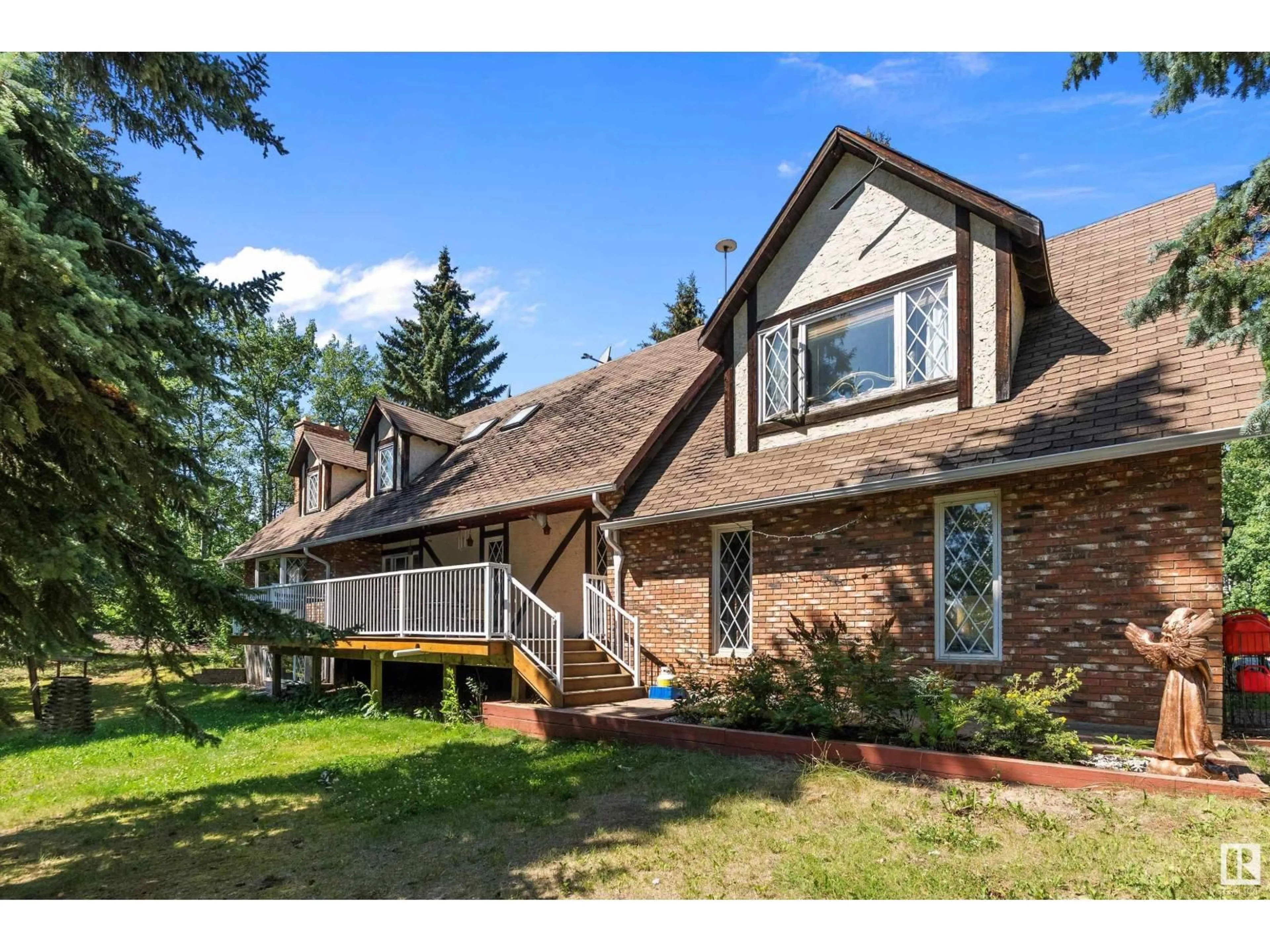 Home with brick exterior material, mountain view for 779 - 18 54023 HGHWAY, Rural Parkland County Alberta T7X3V5