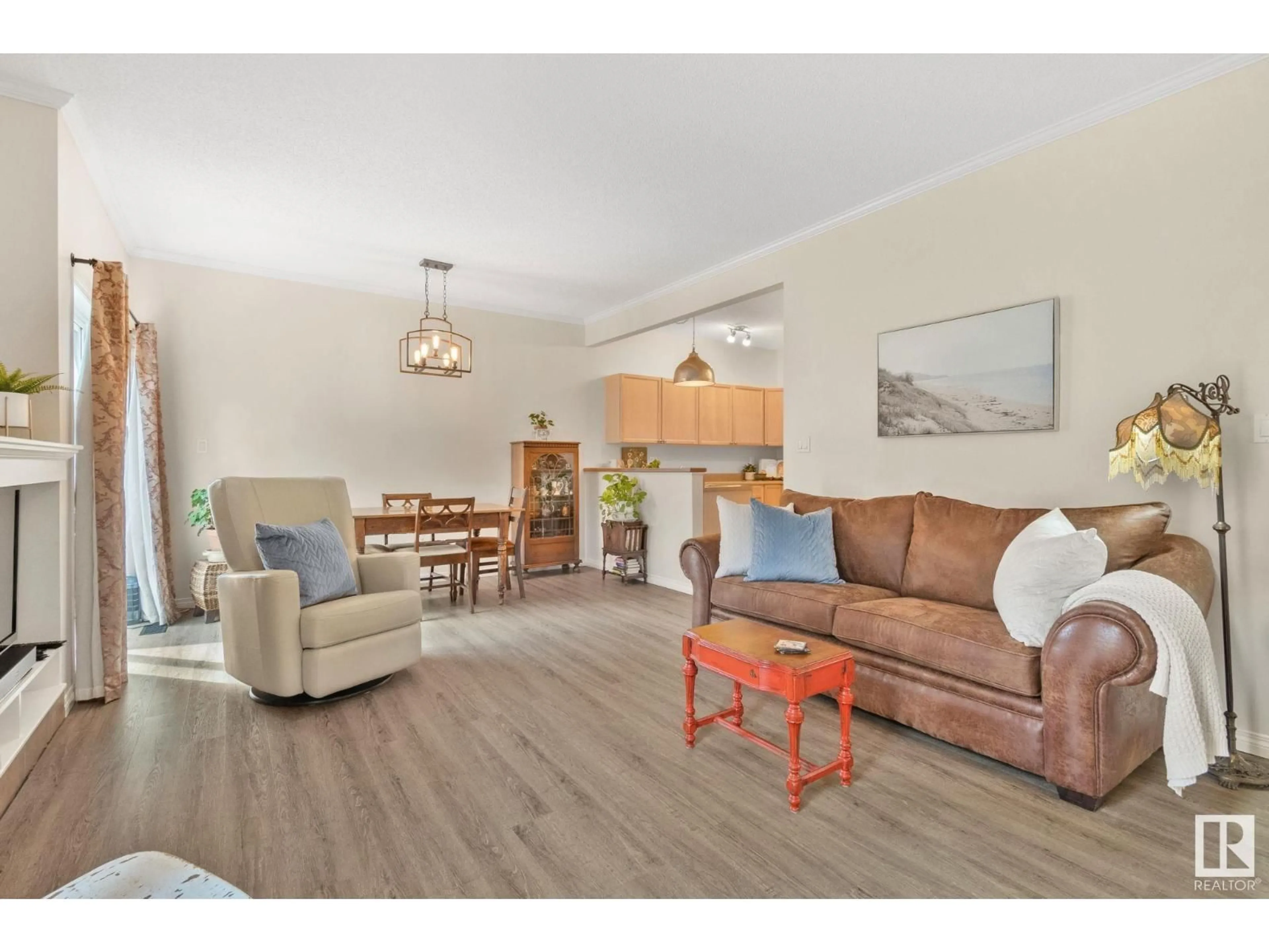 Living room with furniture, wood/laminate floor for #81 - 3040 SPENCE WD, Edmonton Alberta T6X1N7