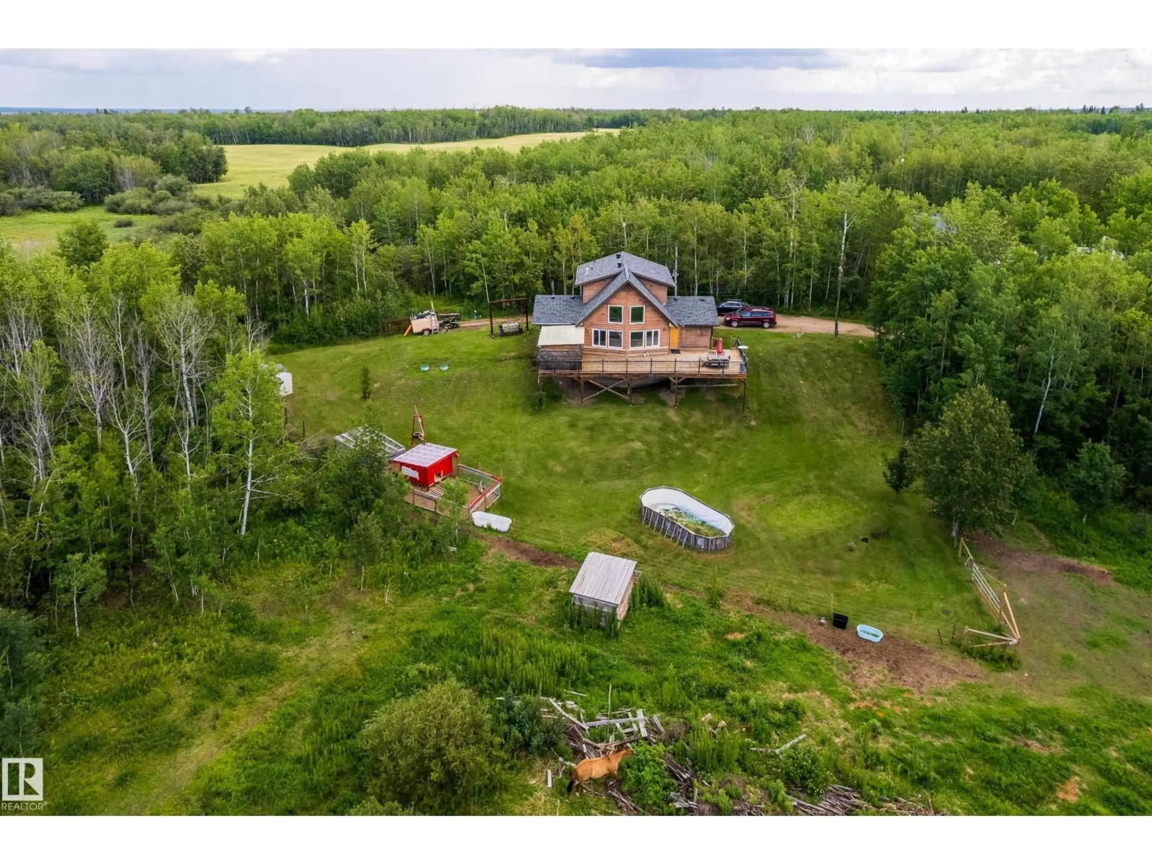 A pic from outside/outdoor area/front of a property/back of a property/a pic from drone, unknown for 193 RGE ROAD 214 RGE ROAD, Rural Strathcona County Alberta T8E1G7