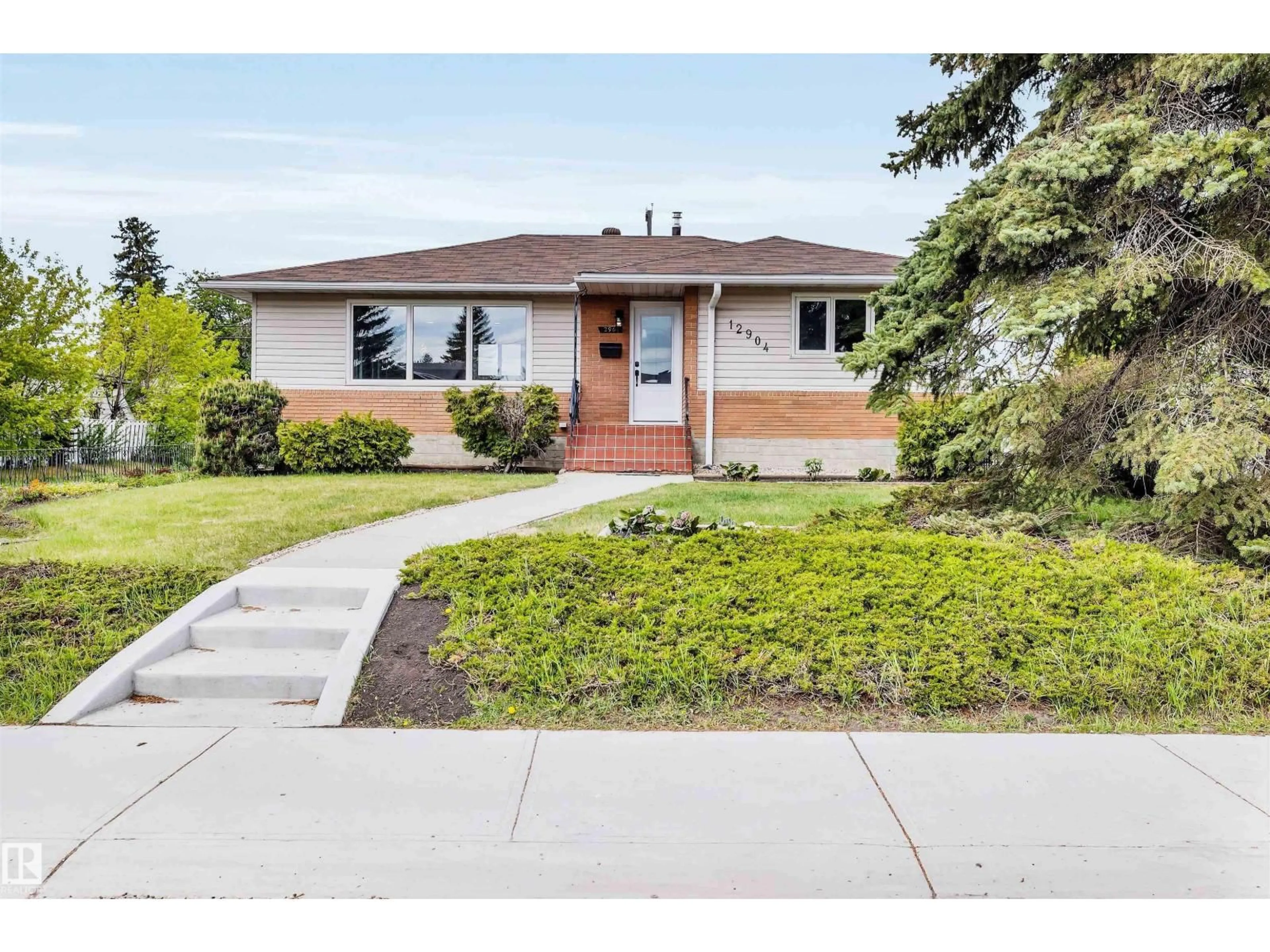 Home with vinyl exterior material, street for NW - 12904 95A ST, Edmonton Alberta T5E4A1