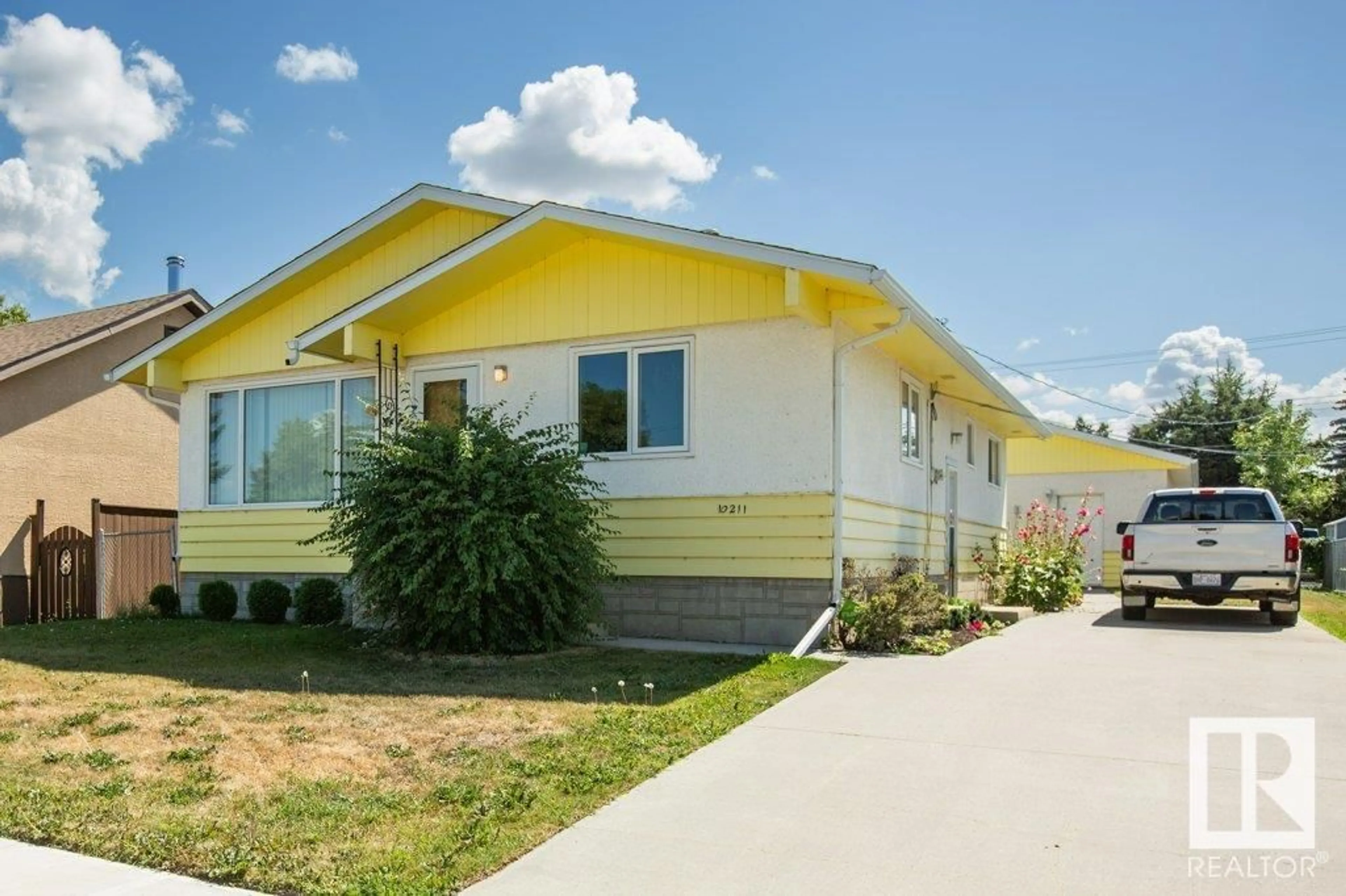 Home with vinyl exterior material, street for 10211 105 ST, Westlock Alberta T7P1V8