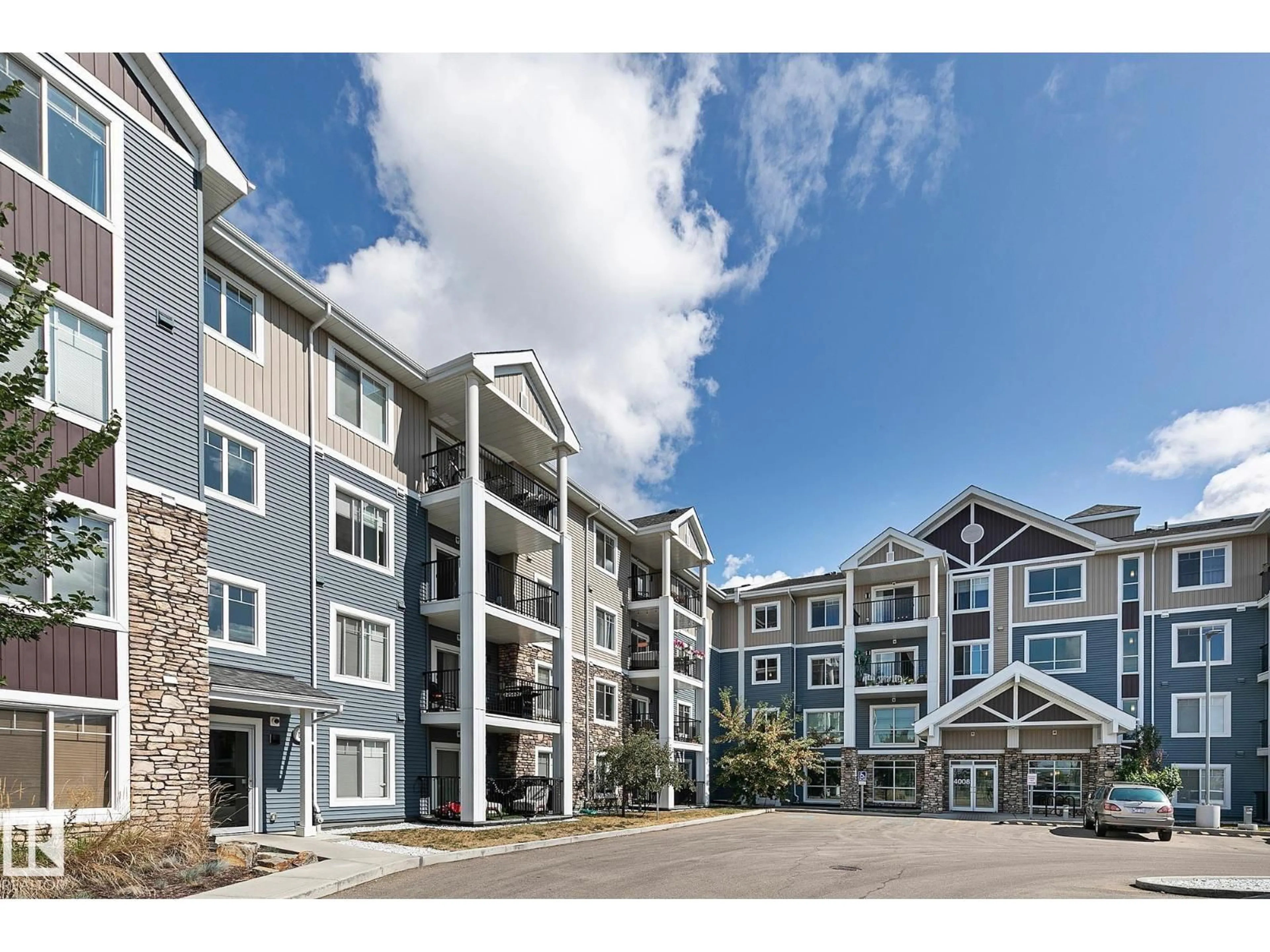 A pic from outside/outdoor area/front of a property/back of a property/a pic from drone, mountain view for #104 - 4008 SAVARYN DR, Edmonton Alberta T6X2E5