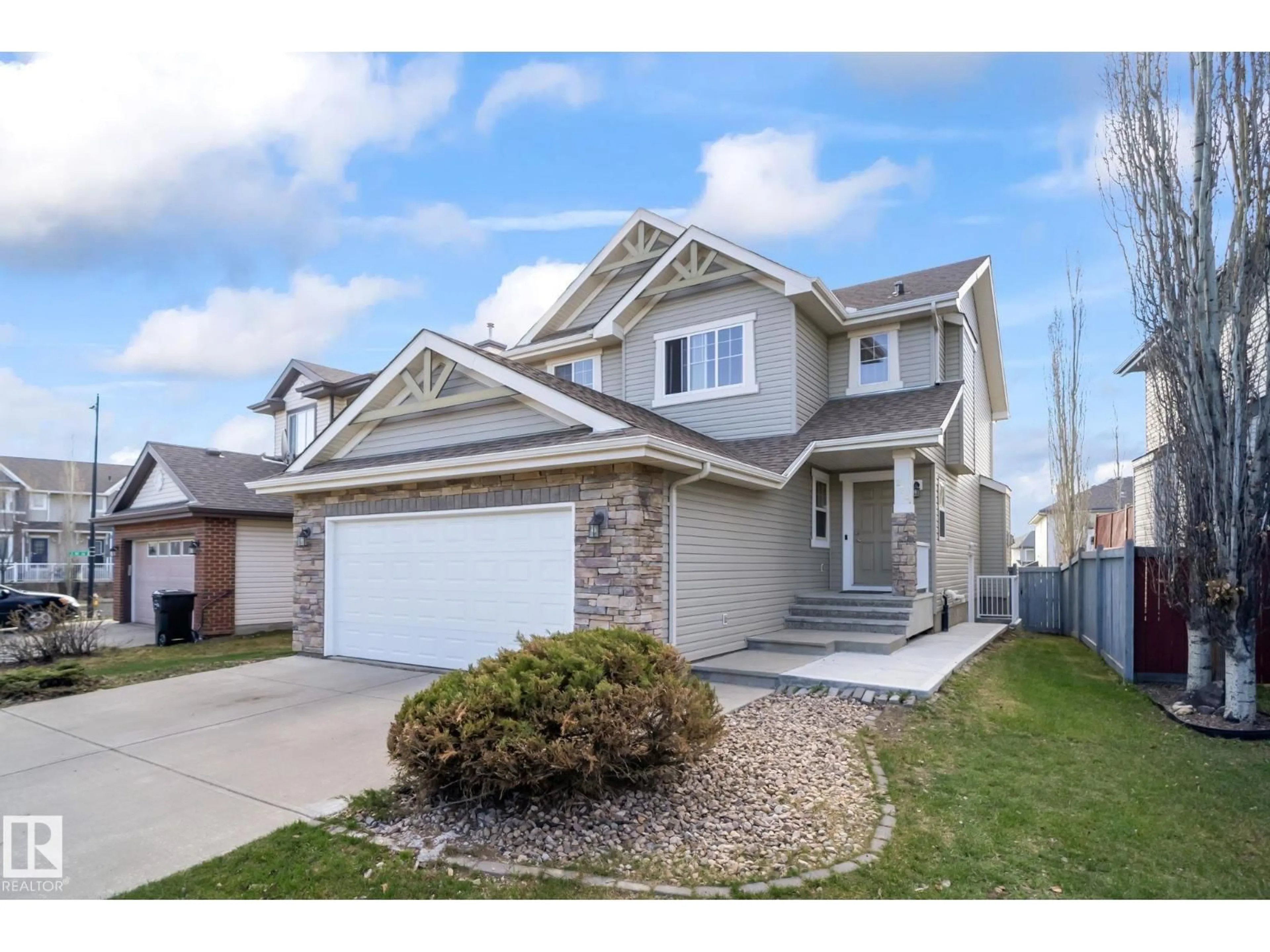 Home with vinyl exterior material, street for 224 54 ST, Edmonton Alberta T6X0L4