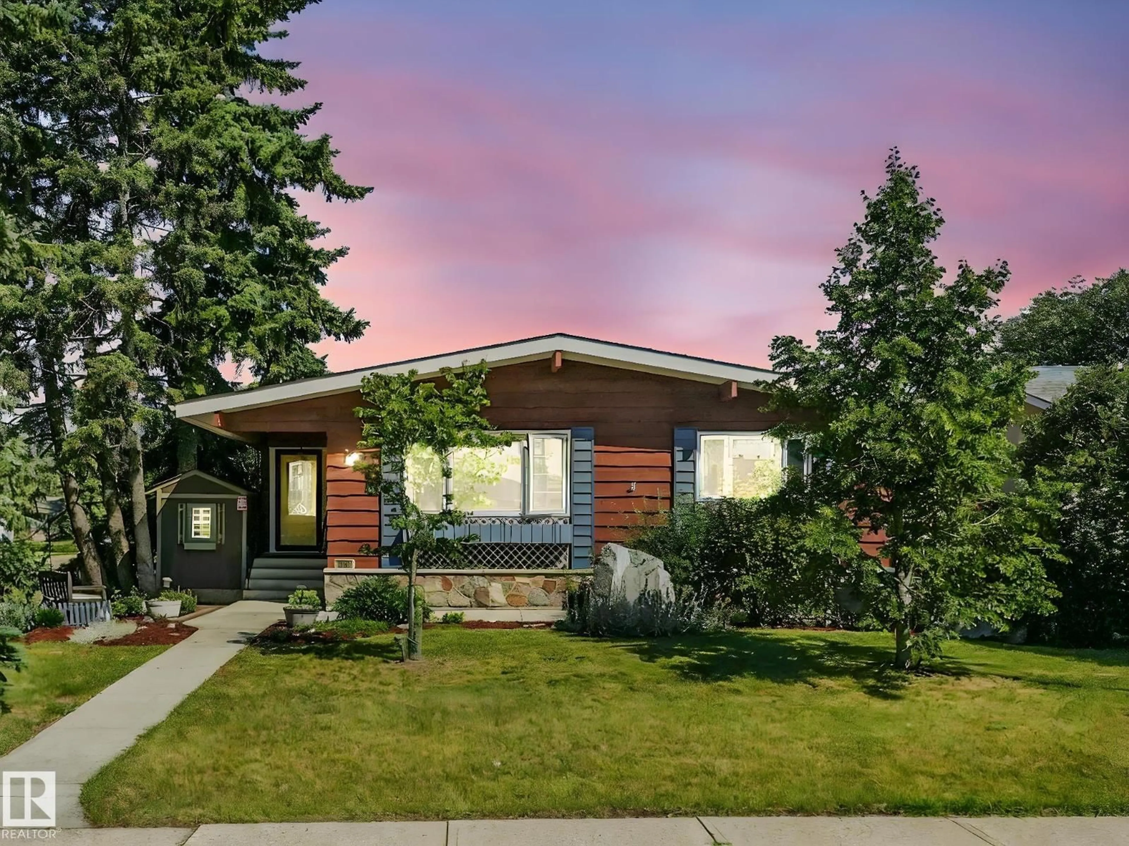 Home with vinyl exterior material, street for 16836 96 AV, Edmonton Alberta T5P0E3