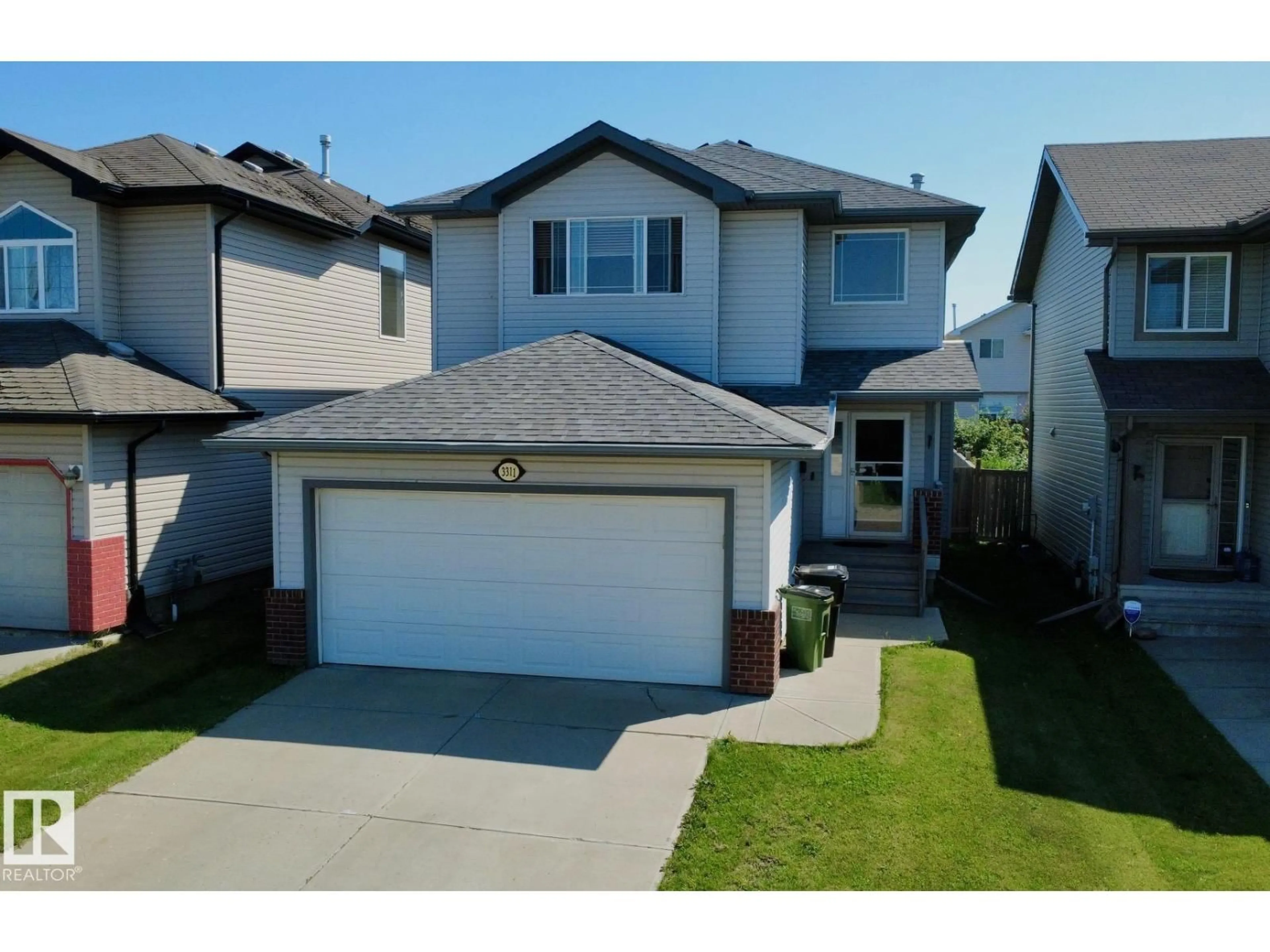 A pic from outside/outdoor area/front of a property/back of a property/a pic from drone, street for 3311 21 ST, Edmonton Alberta T6T0C4