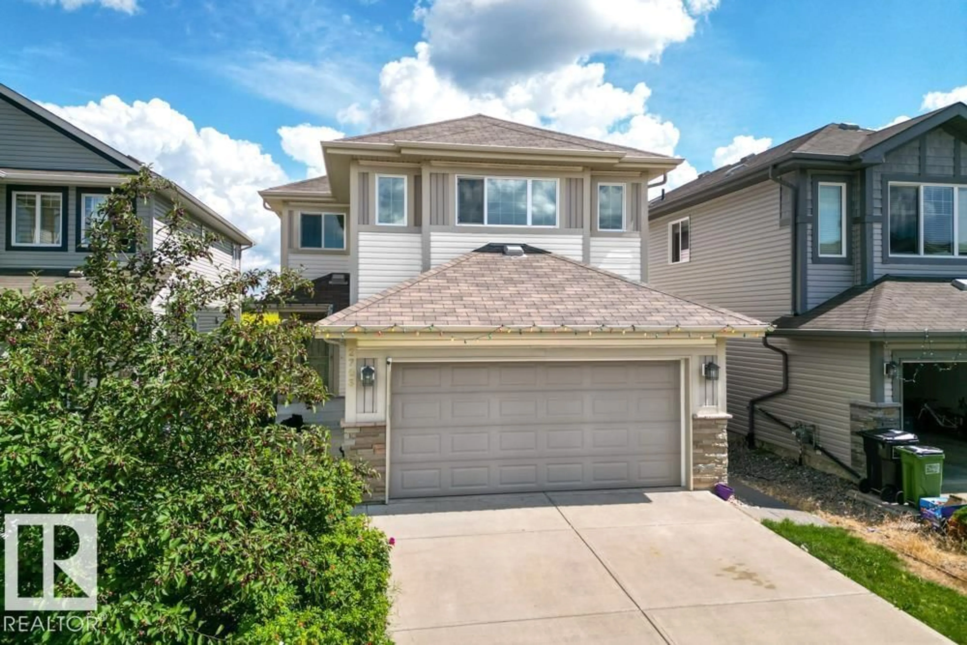 Home with vinyl exterior material, street for 2703 11 ST NW, Edmonton Alberta T6T0X9