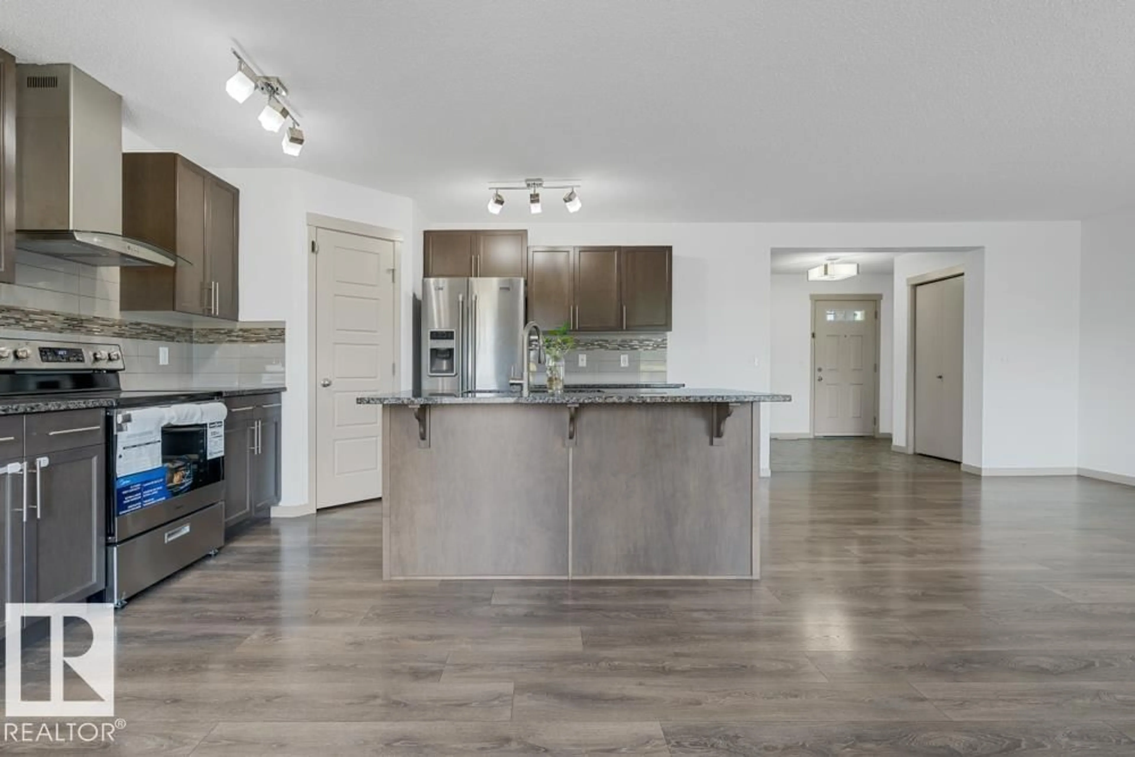 Open concept kitchen, unknown for 2703 11 ST NW, Edmonton Alberta T6T0X9