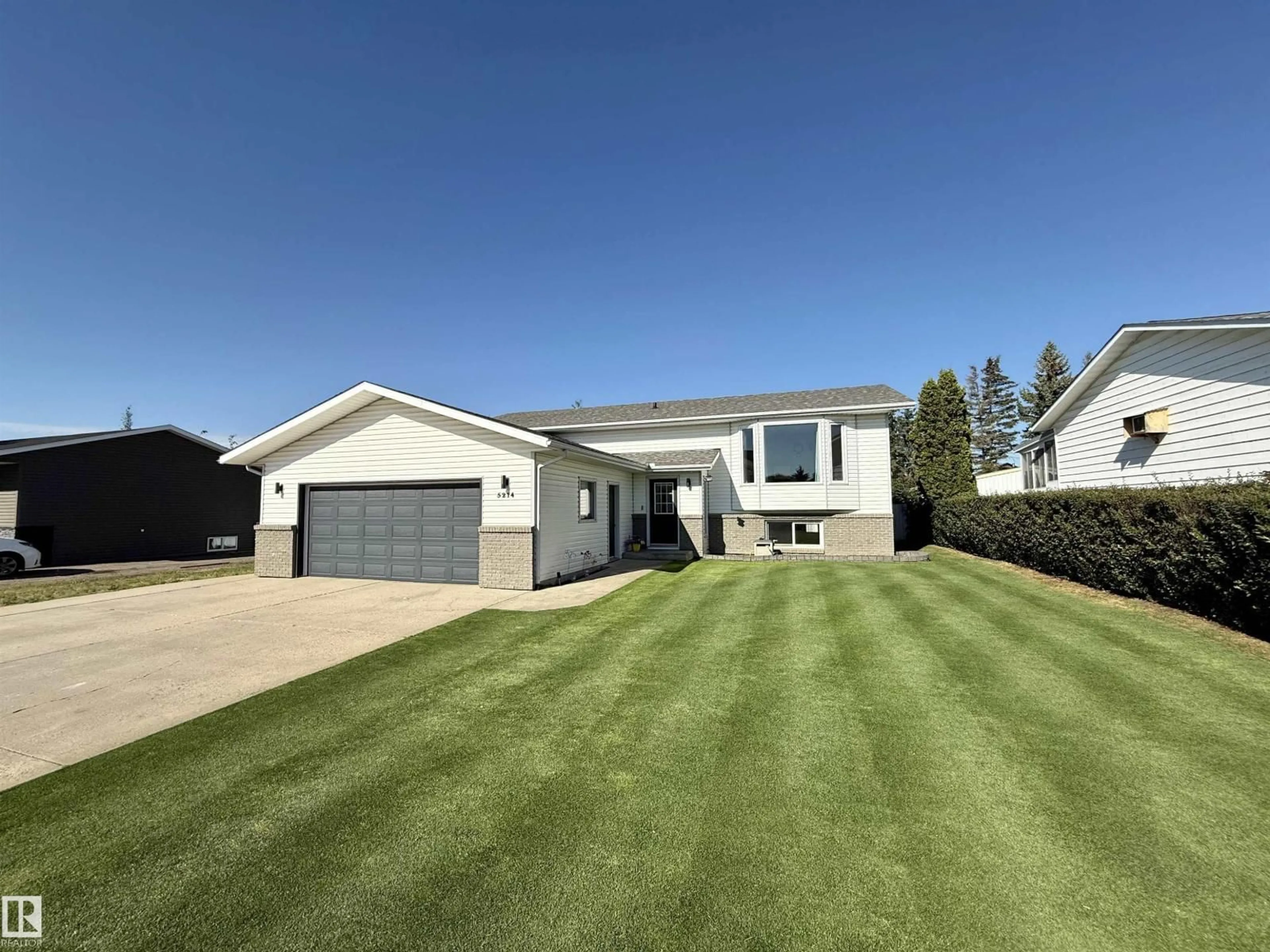 A pic from outside/outdoor area/front of a property/back of a property/a pic from drone, street for 5214 56A ST, St. Paul Town Alberta T0A3A1