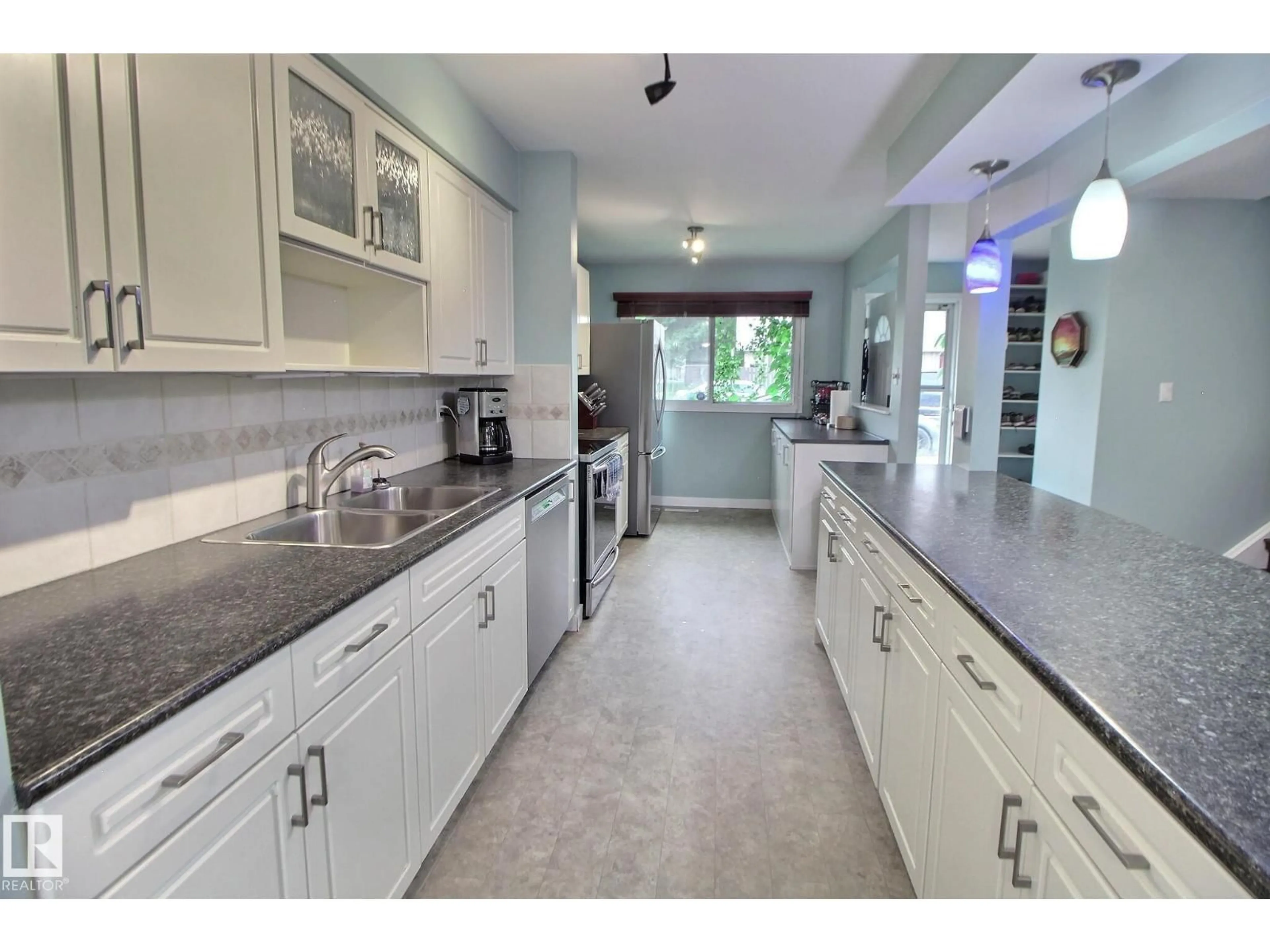 Open concept kitchen, ceramic/tile floor for 49 ROYAL RD, Edmonton Alberta T6J2E7