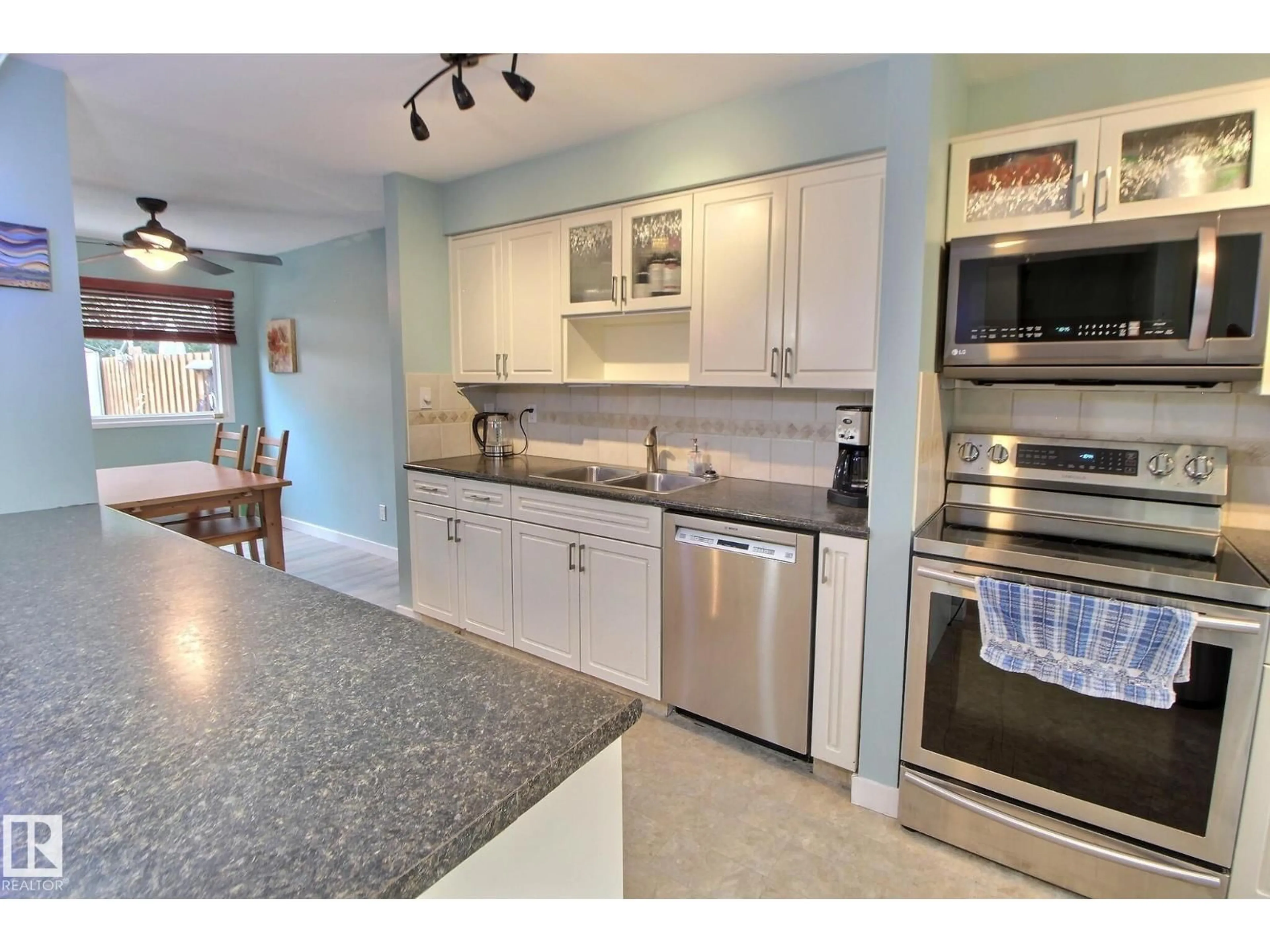 Open concept kitchen, ceramic/tile floor for 49 ROYAL RD, Edmonton Alberta T6J2E7