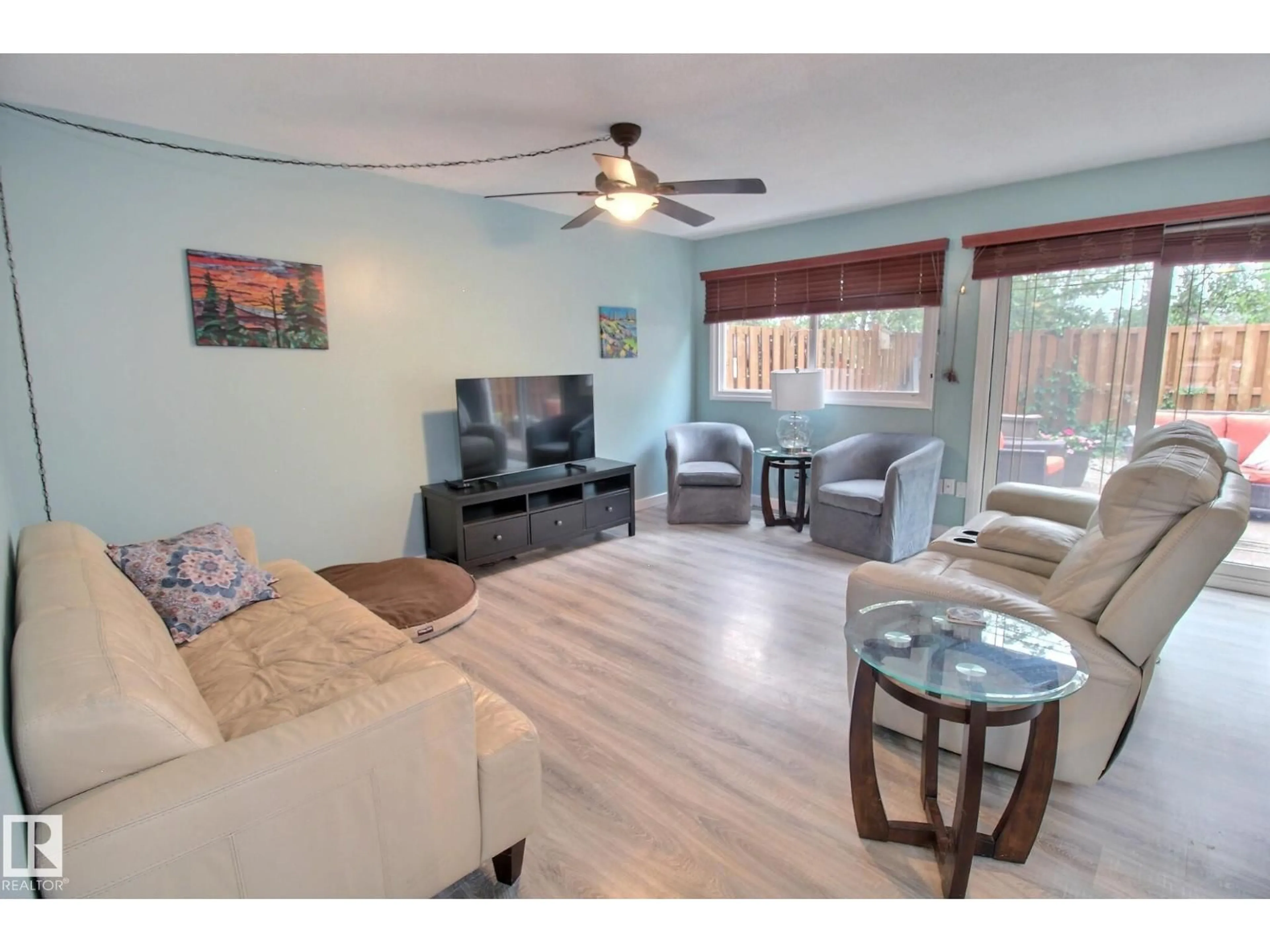 Living room with furniture, wood/laminate floor for 49 ROYAL RD, Edmonton Alberta T6J2E7