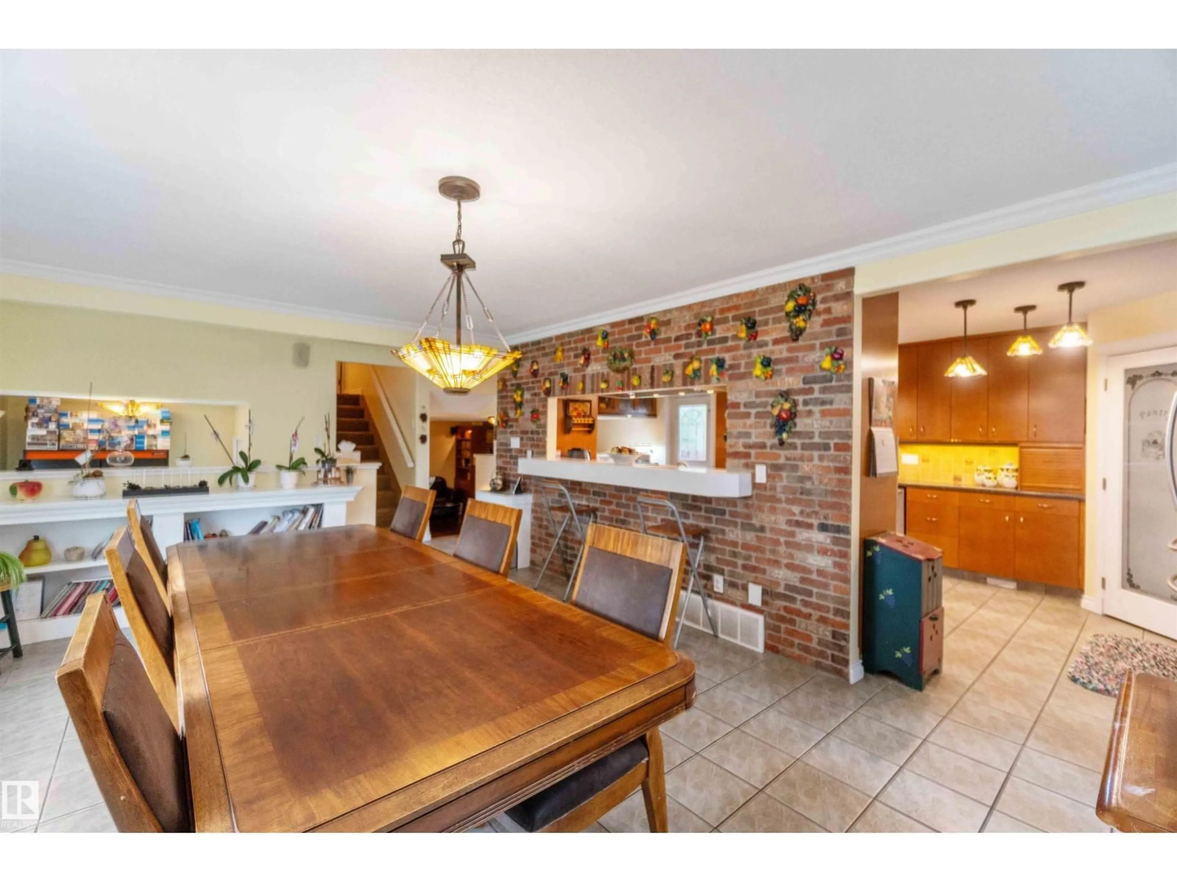 Open concept kitchen, ceramic/tile floor for 5102 56 AV, Leduc Alberta T9E5N3