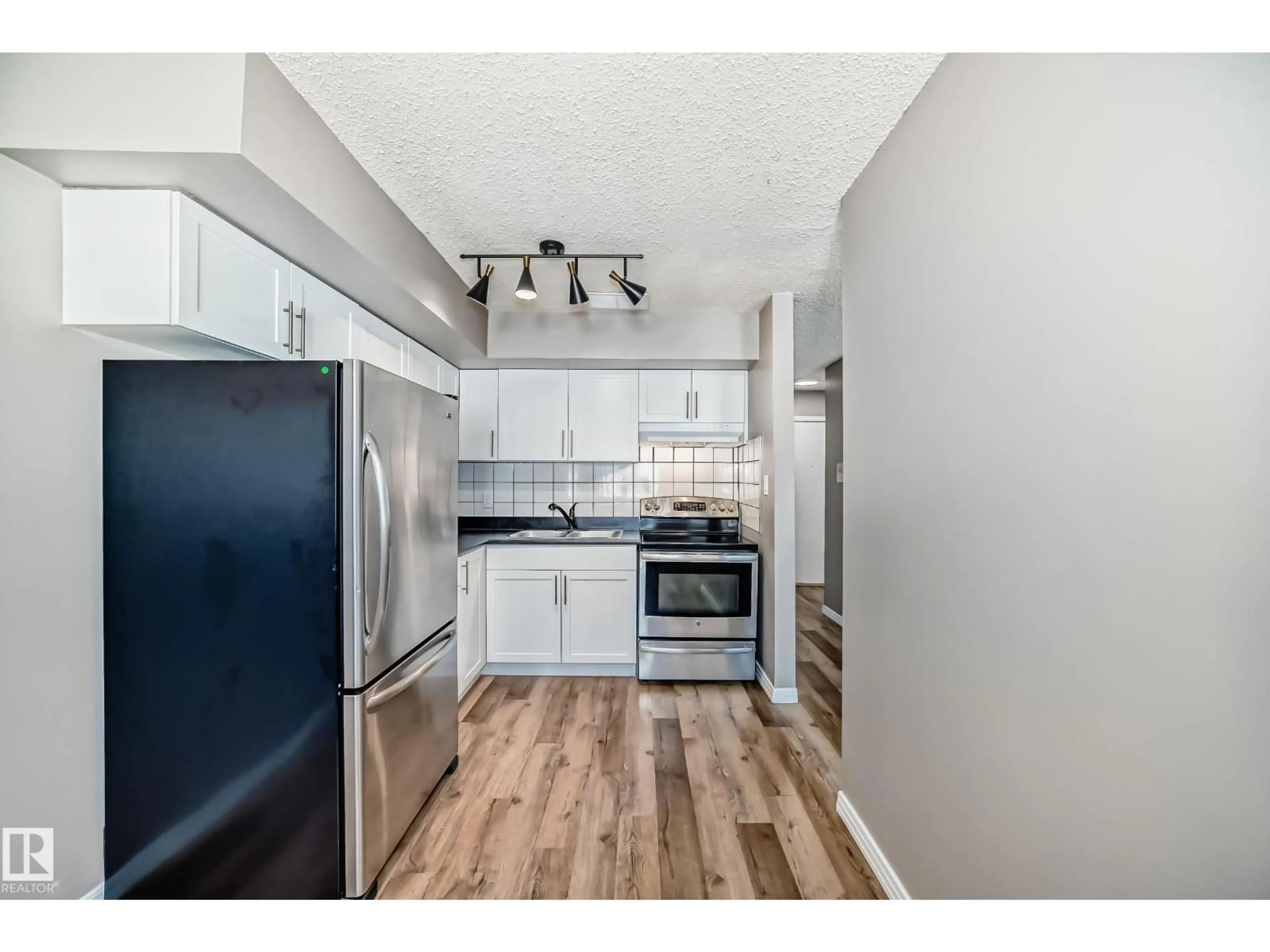 Standard kitchen, unknown for #112 - 16340 109 ST, Edmonton Alberta T5X2T4