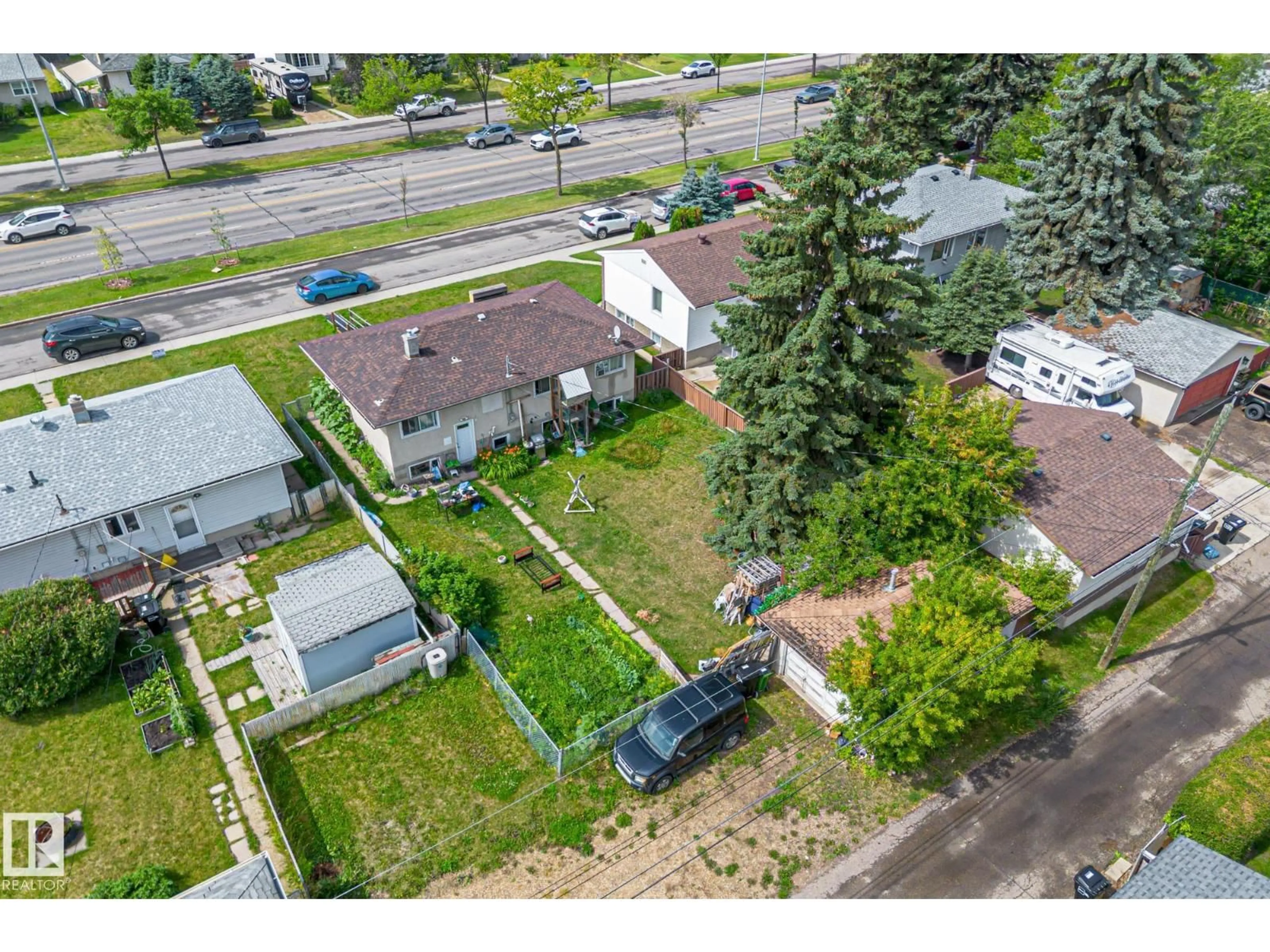 A pic from outside/outdoor area/front of a property/back of a property/a pic from drone, street for 12219 ST ALBERT TR, Edmonton Alberta T5L4G5