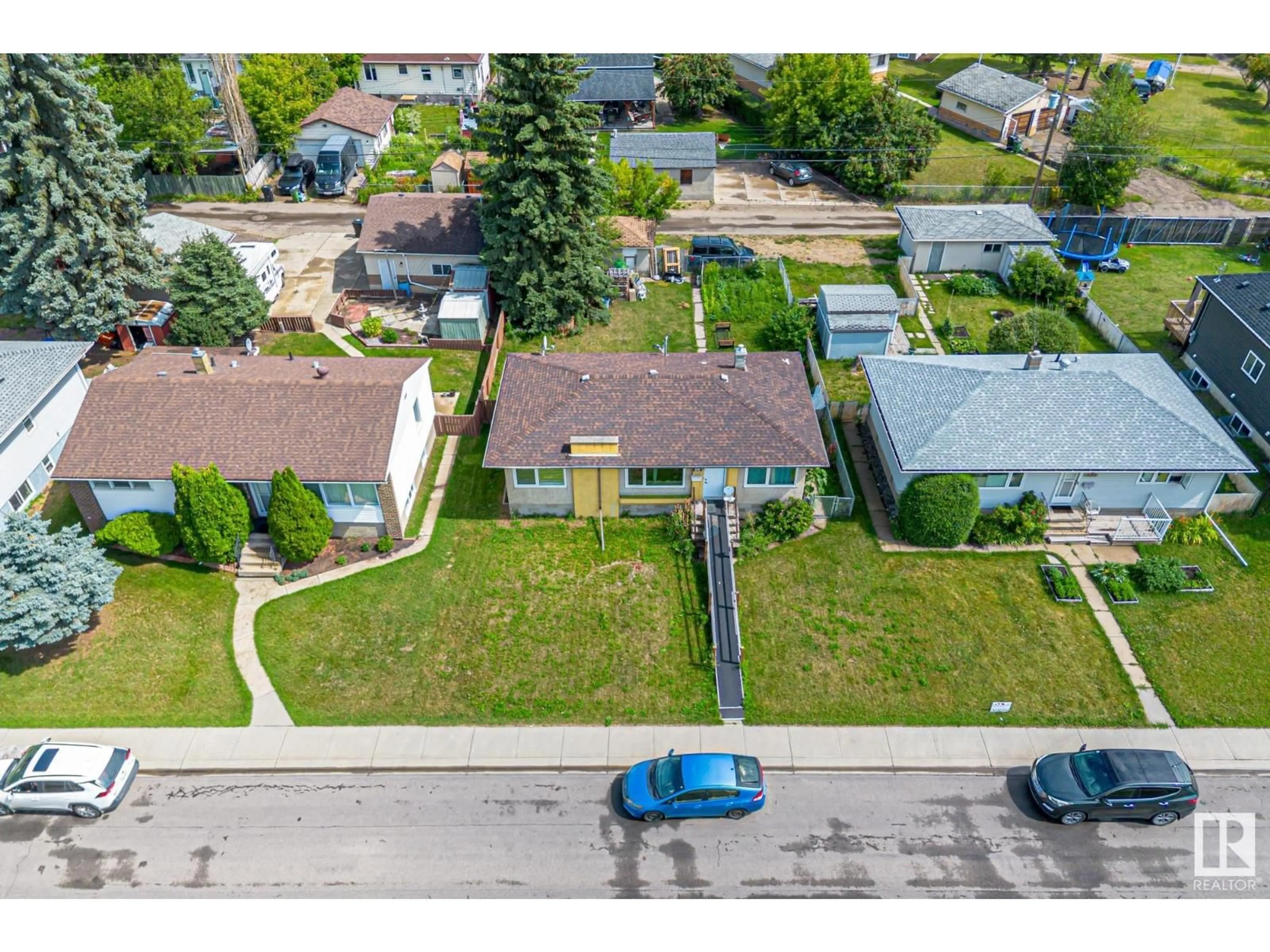 A pic from outside/outdoor area/front of a property/back of a property/a pic from drone, street for 12219 ST ALBERT TR, Edmonton Alberta T5L4G5