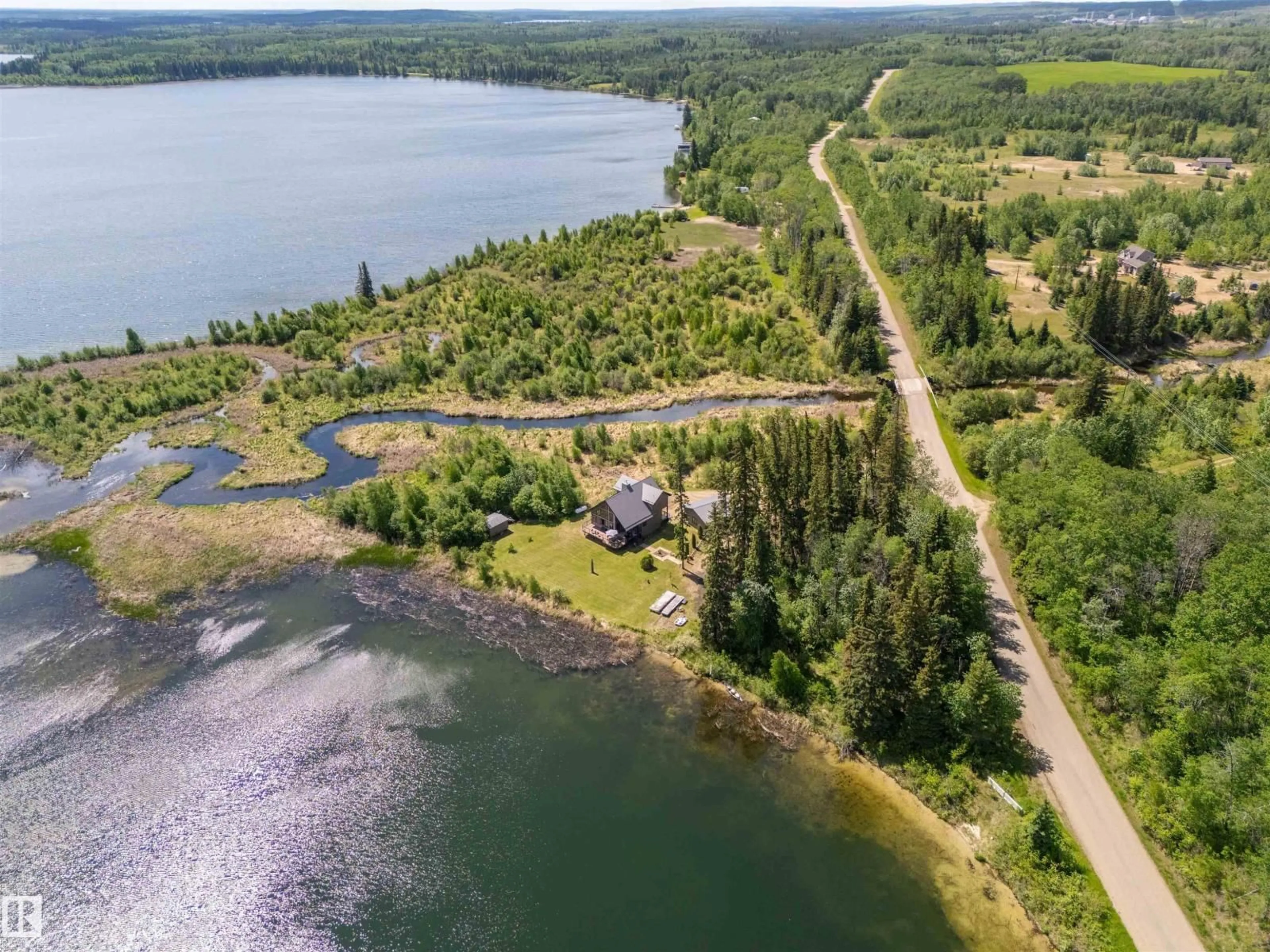 A pic from outside/outdoor area/front of a property/back of a property/a pic from drone, water/lake/river/ocean view for 43123 TWP RD 642 A, Rural Bonnyville M.D. Alberta T9M1P3