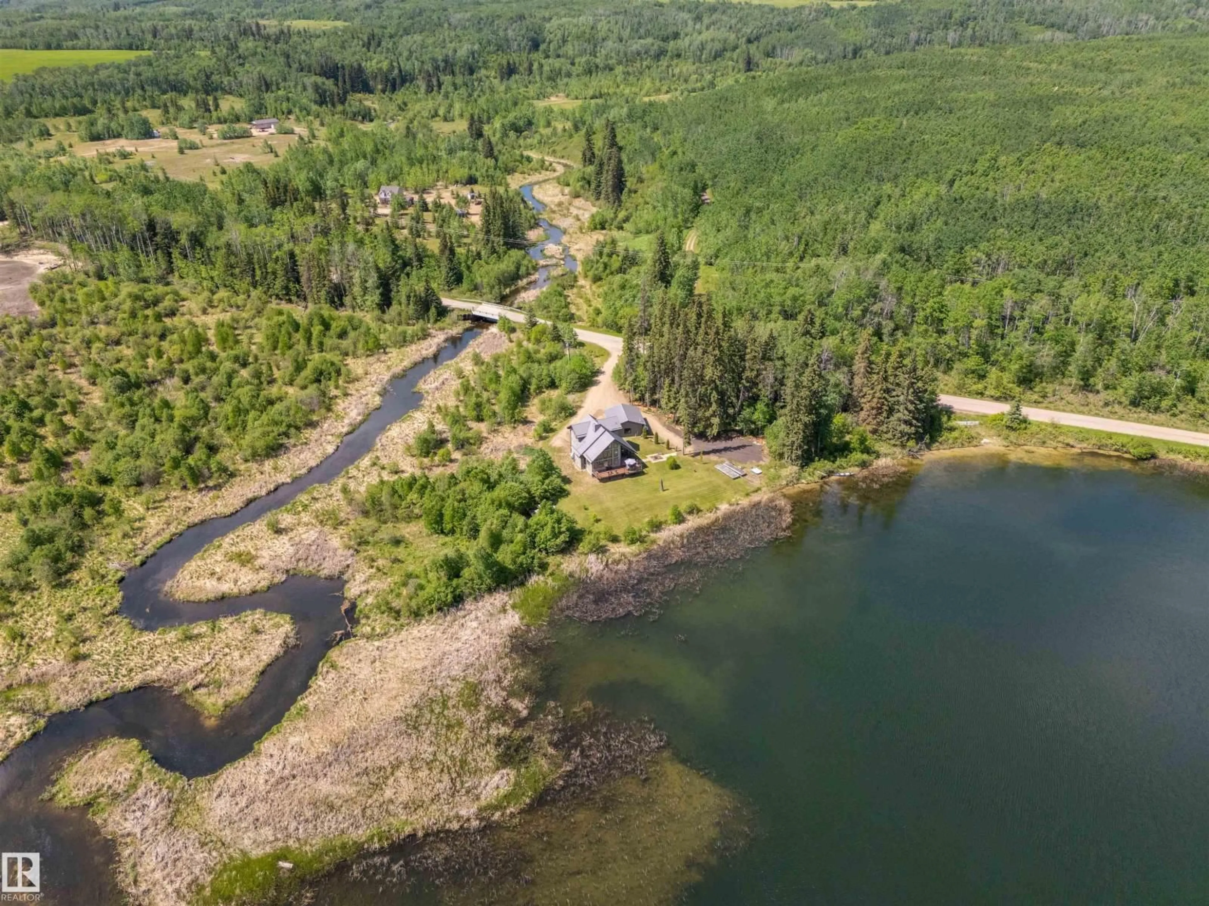 A pic from outside/outdoor area/front of a property/back of a property/a pic from drone, water/lake/river/ocean view for 43123 TWP RD 642 A, Rural Bonnyville M.D. Alberta T9M1P3