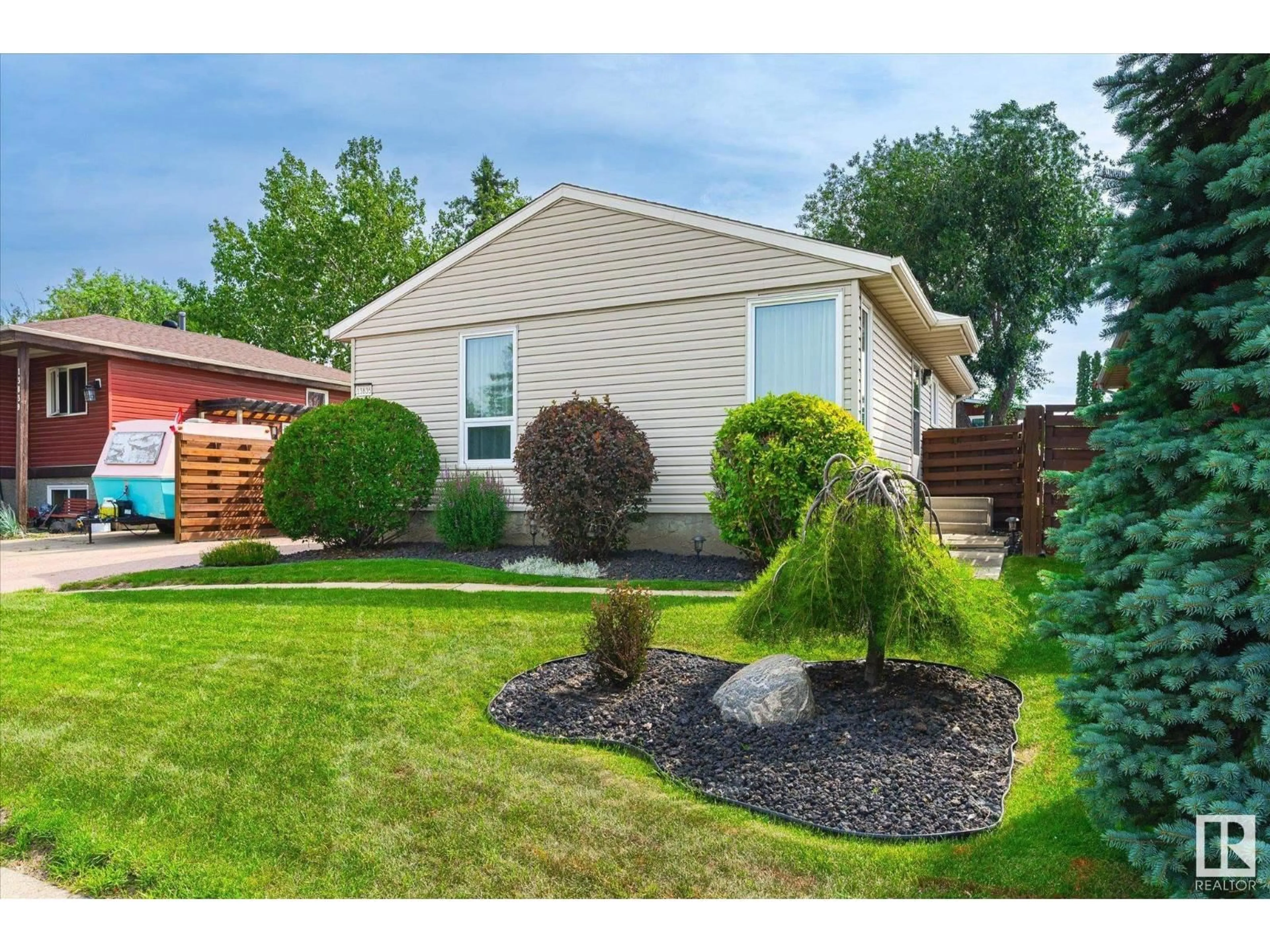 Home with vinyl exterior material, street for NW - 13835 27 ST, Edmonton Alberta T5Y1A2