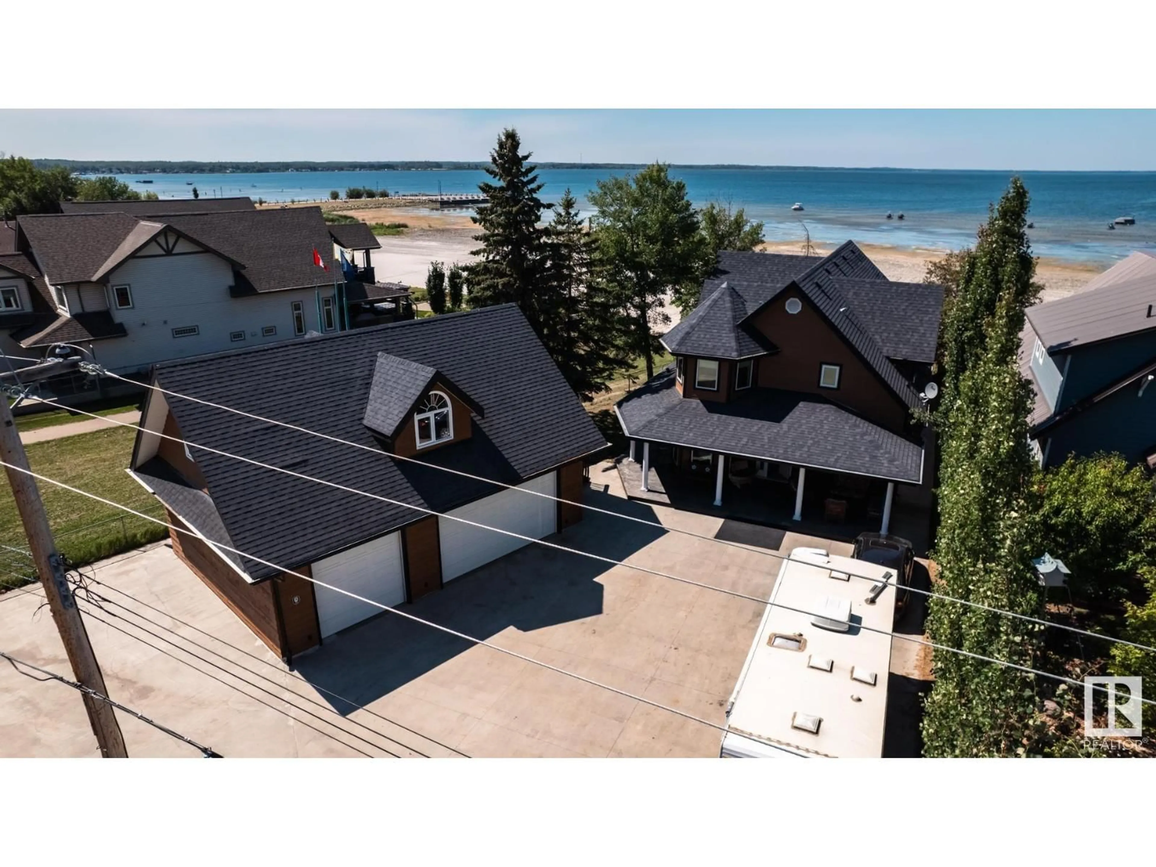 A pic from outside/outdoor area/front of a property/back of a property/a pic from drone, unknown for 4632 50 AV, Rural Lac Ste. Anne County Alberta T0E0A0