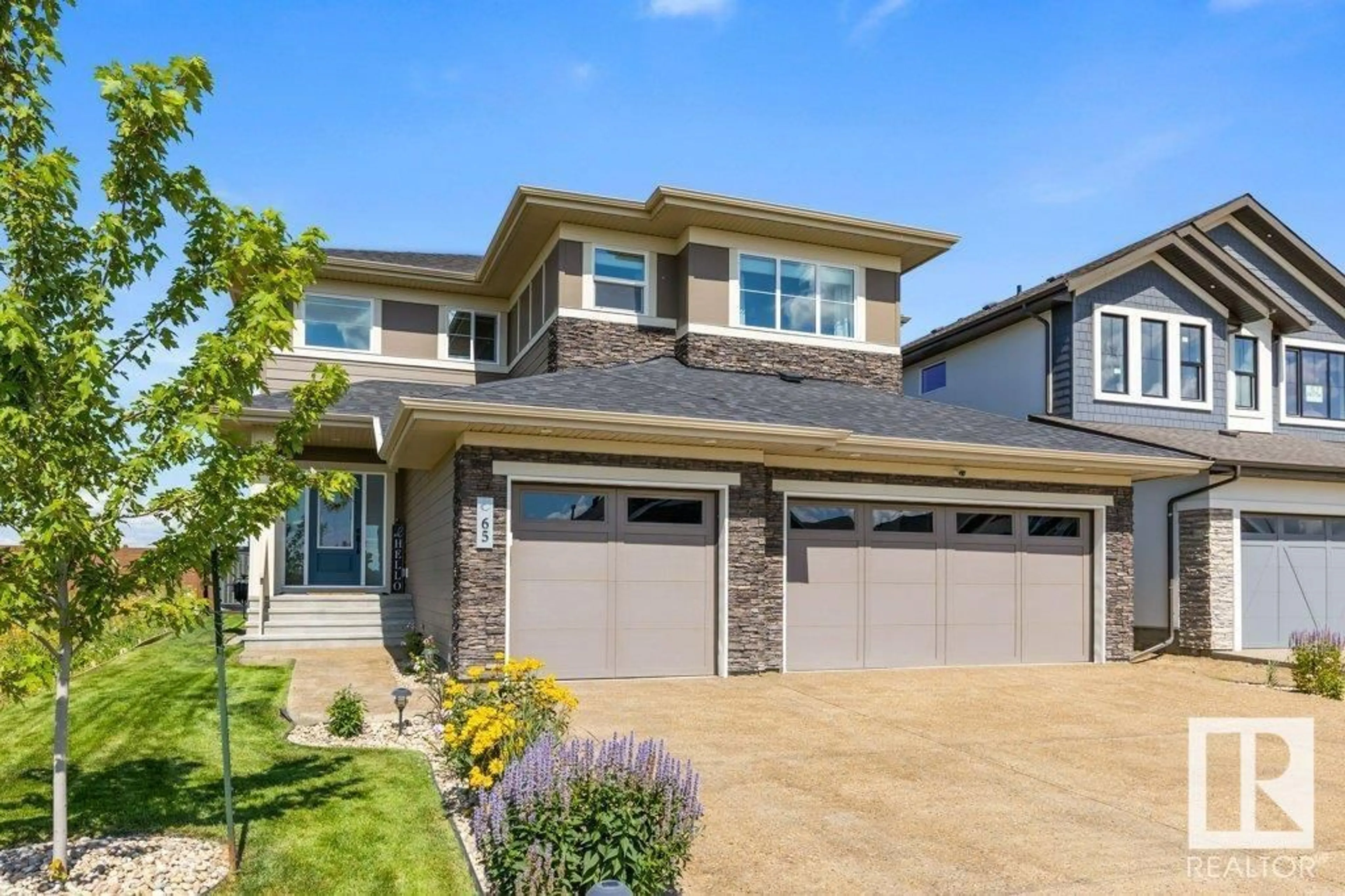 Home with vinyl exterior material, street for 65 JUBILATION DR, St. Albert Alberta T8N7W7