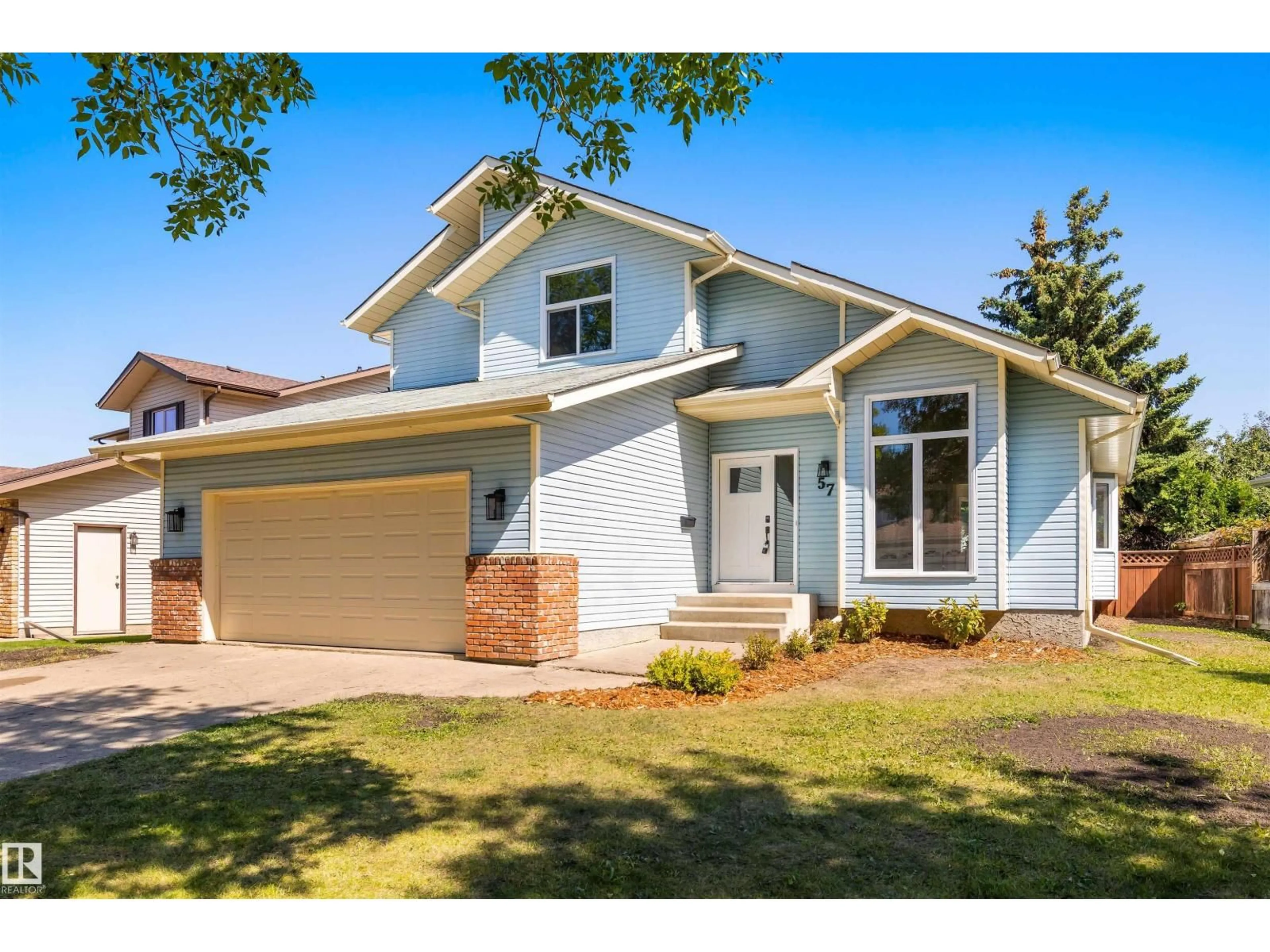 Home with vinyl exterior material, street for 57 DEANE CR, St. Albert Alberta T8N5A2