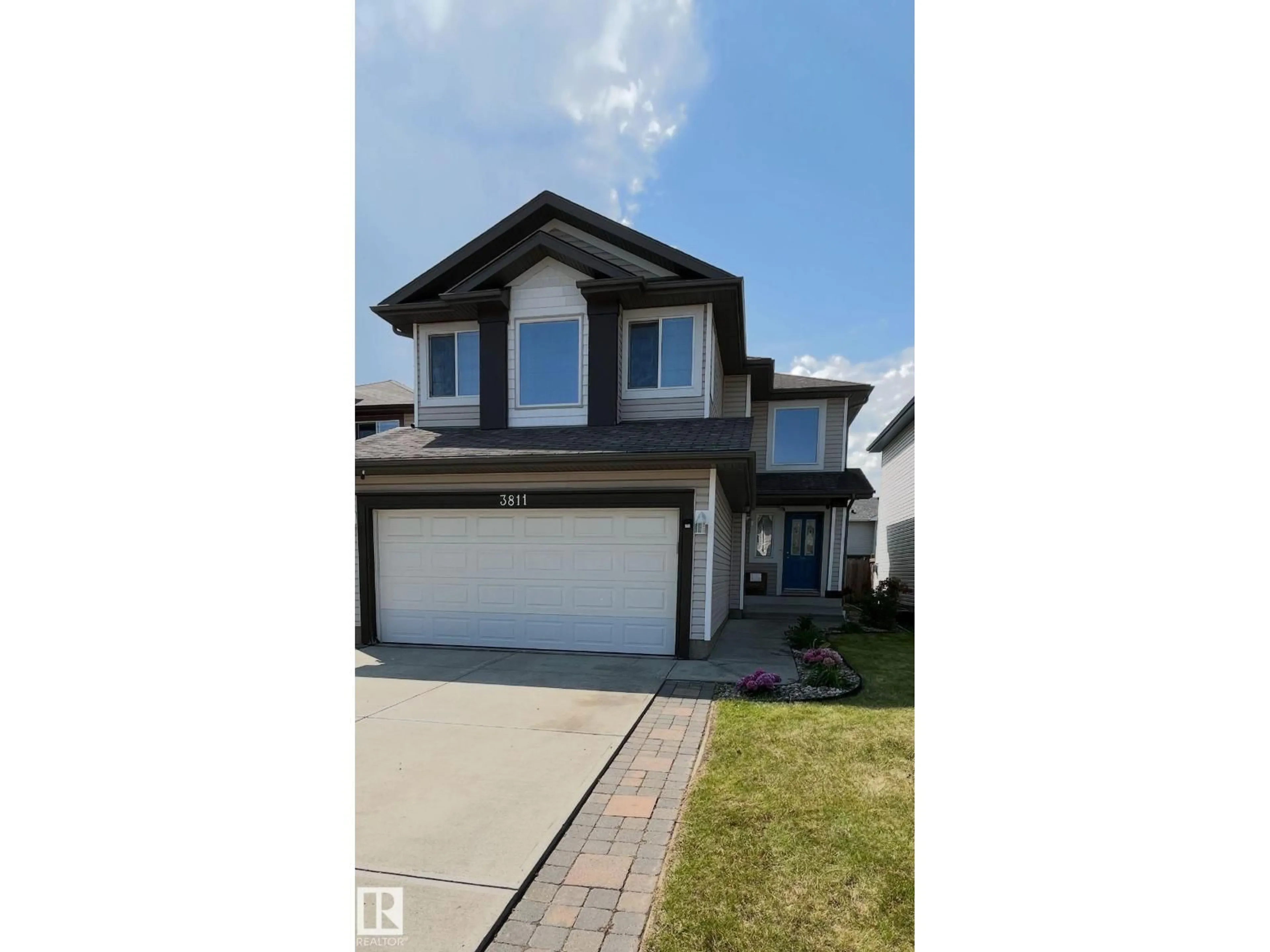 Home with vinyl exterior material, street for 3811 MCLEAN CL, Edmonton Alberta T6W1R4