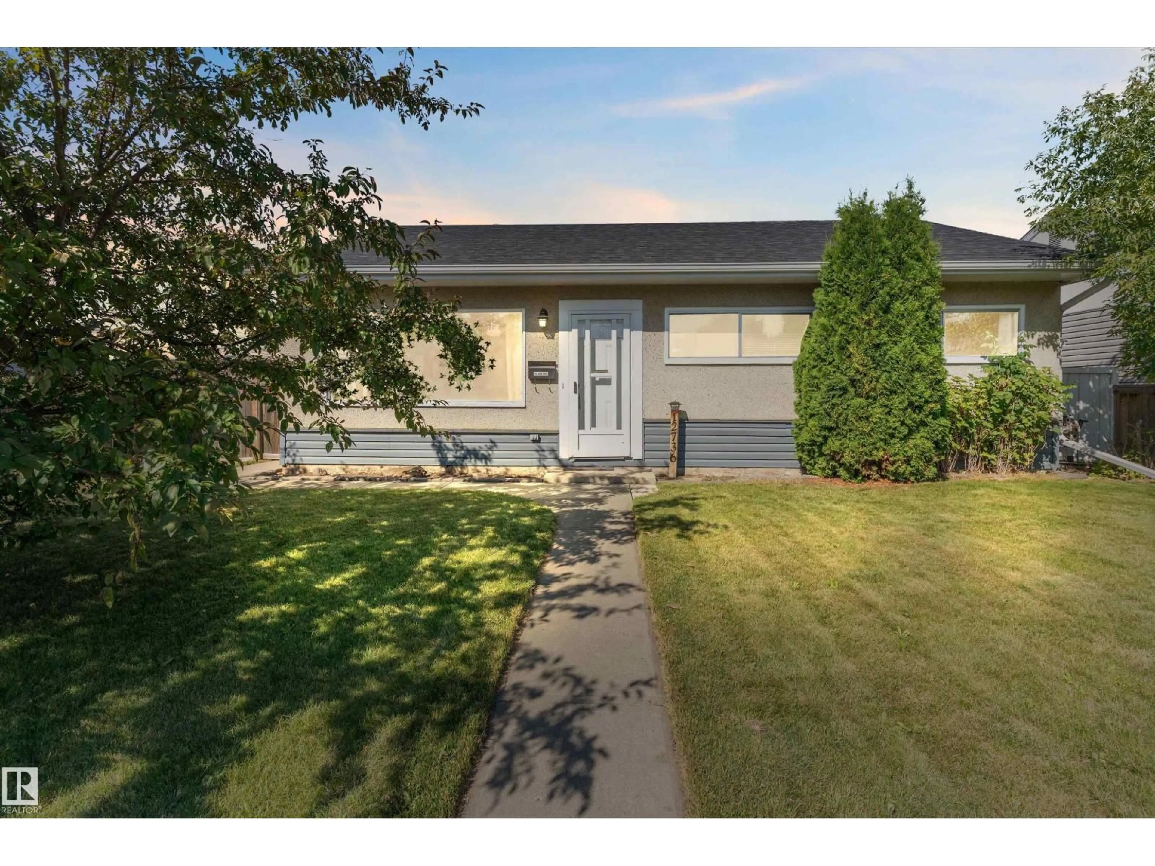 Home with vinyl exterior material, street for NW - 12736 135 ST, Edmonton Alberta T5L1Y2