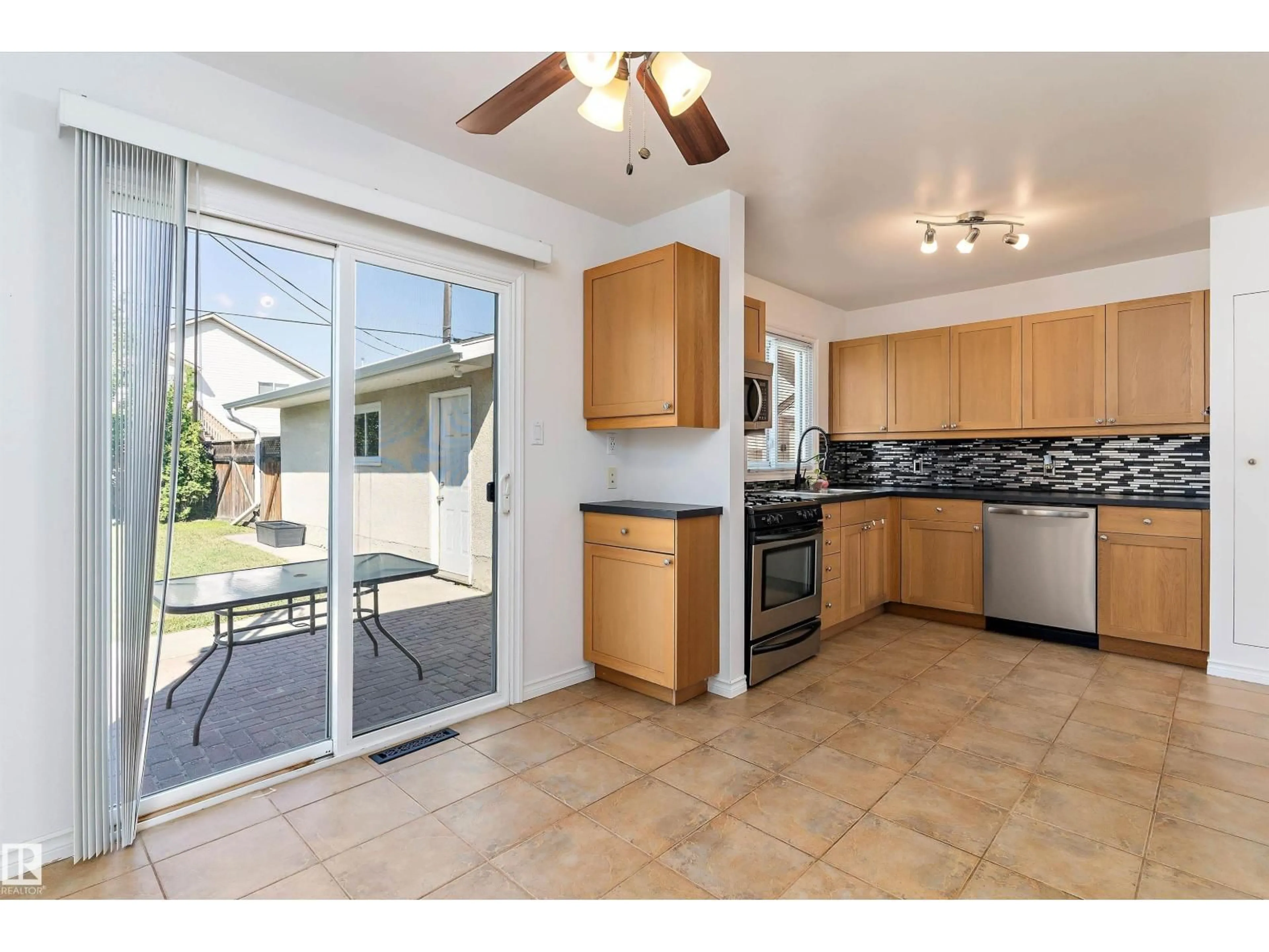 Open concept kitchen, ceramic/tile floor for NW - 12736 135 ST, Edmonton Alberta T5L1Y2