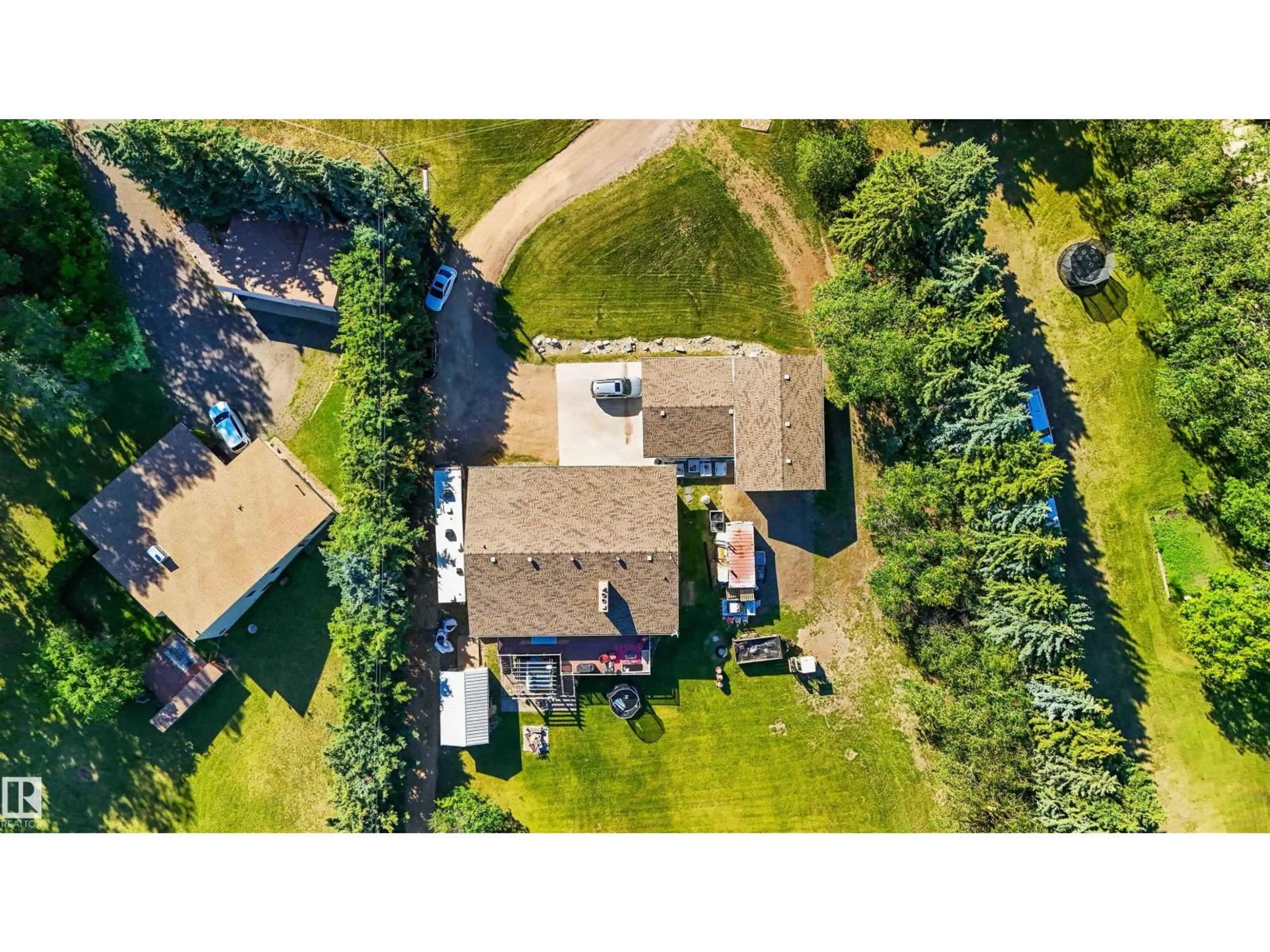 A pic from outside/outdoor area/front of a property/back of a property/a pic from drone, street for 55305 RGE ROAD 242, Rural Sturgeon County Alberta T5E5S7