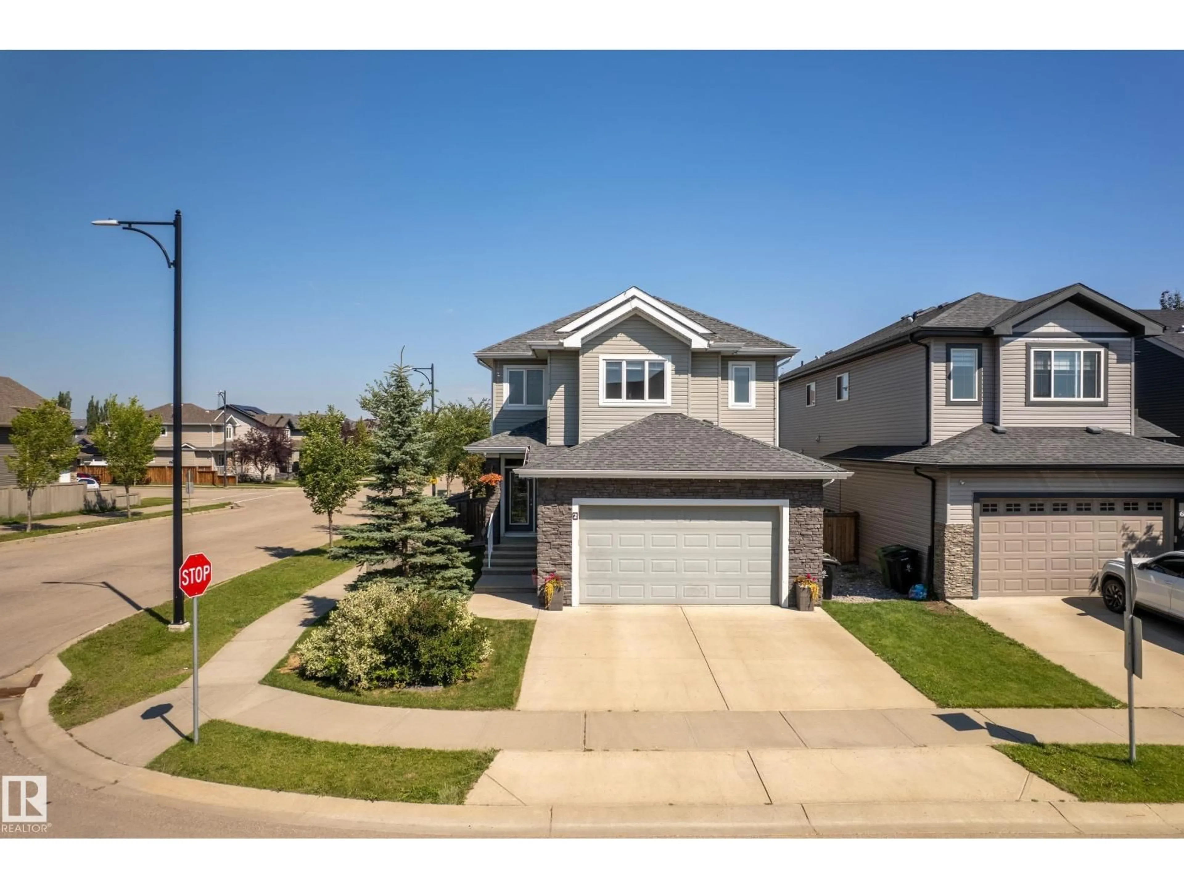 A pic from outside/outdoor area/front of a property/back of a property/a pic from drone, street for 2 ELLICE BN, Fort Saskatchewan Alberta T8L0T8