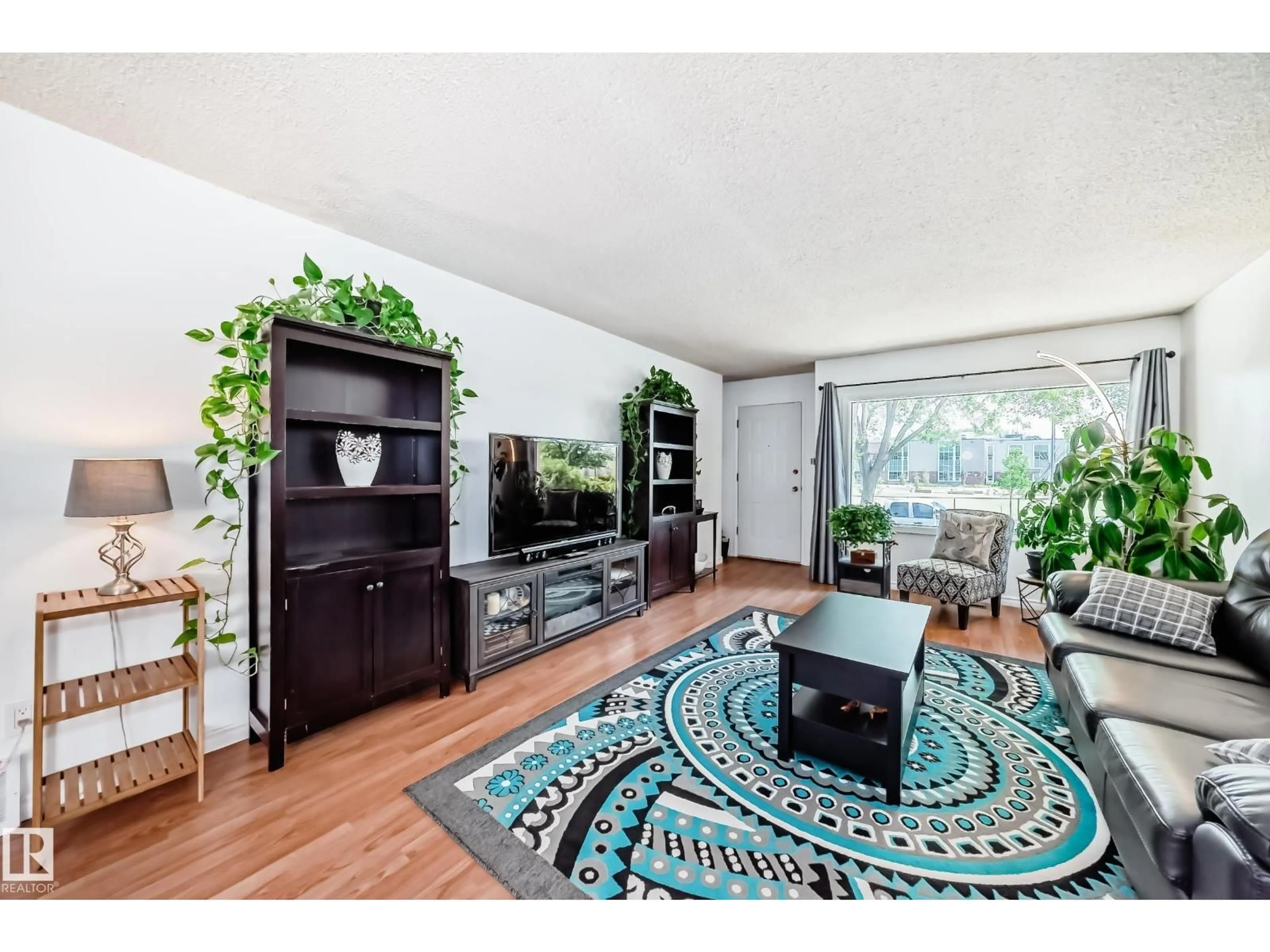 Living room with furniture, unknown for NW - 11832 64 ST, Edmonton Alberta T5W4J1