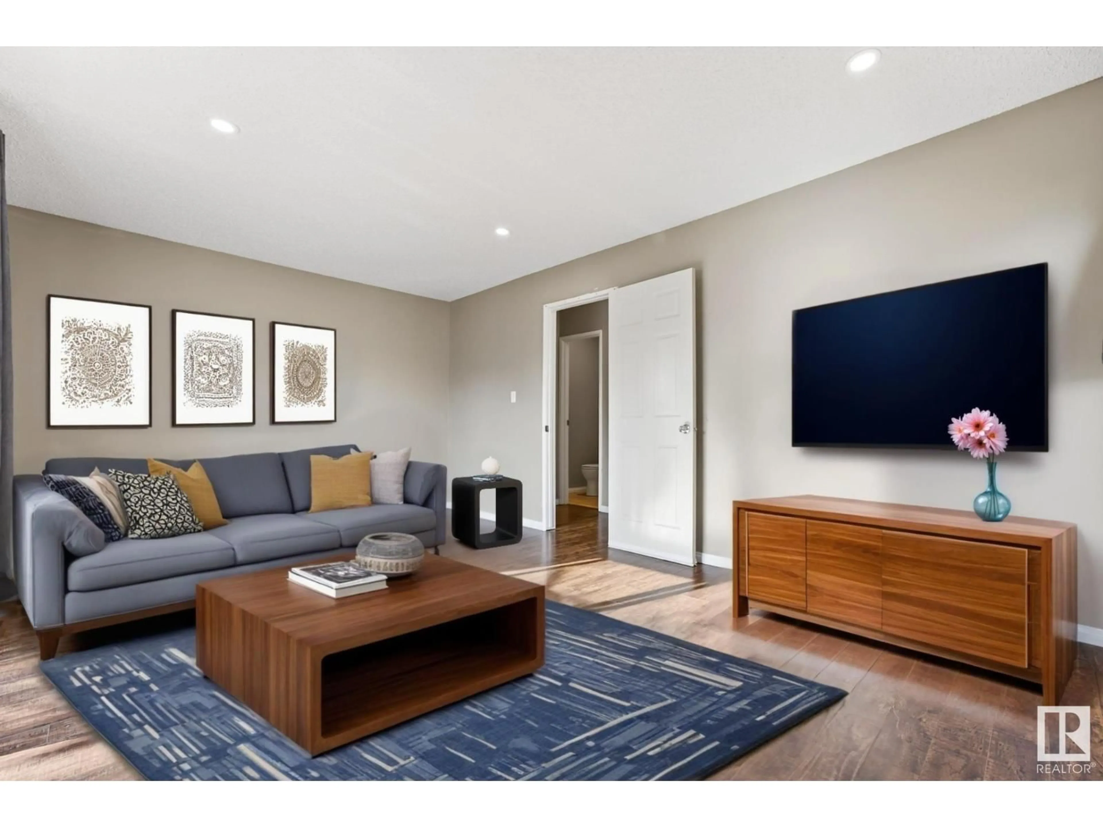 Living room with furniture, wood/laminate floor for #2 - 4513 48 ST, Leduc Alberta T9E5Y4
