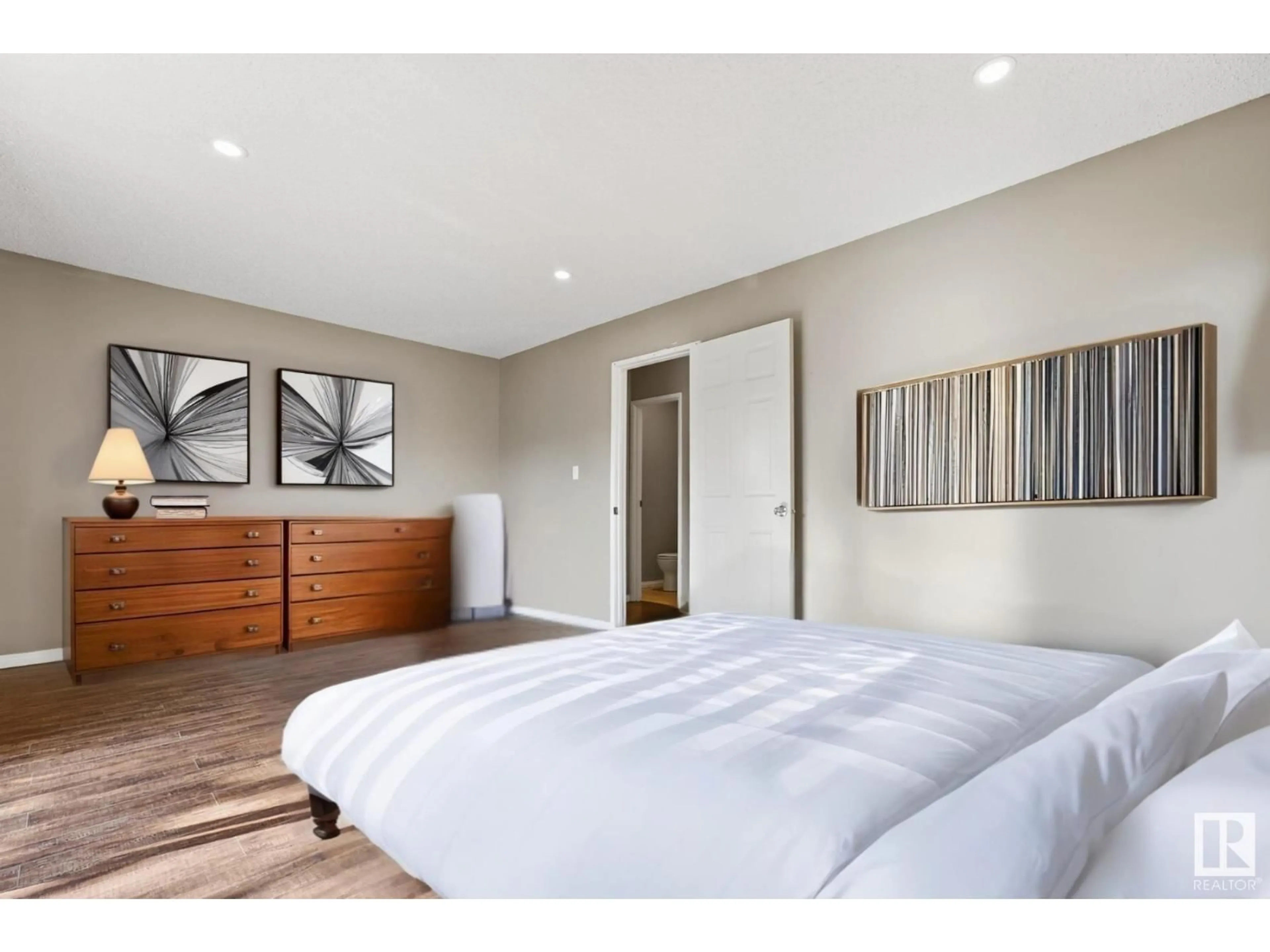 Bedroom with bed, wood/laminate floor for #2 - 4513 48 ST, Leduc Alberta T9E5Y4