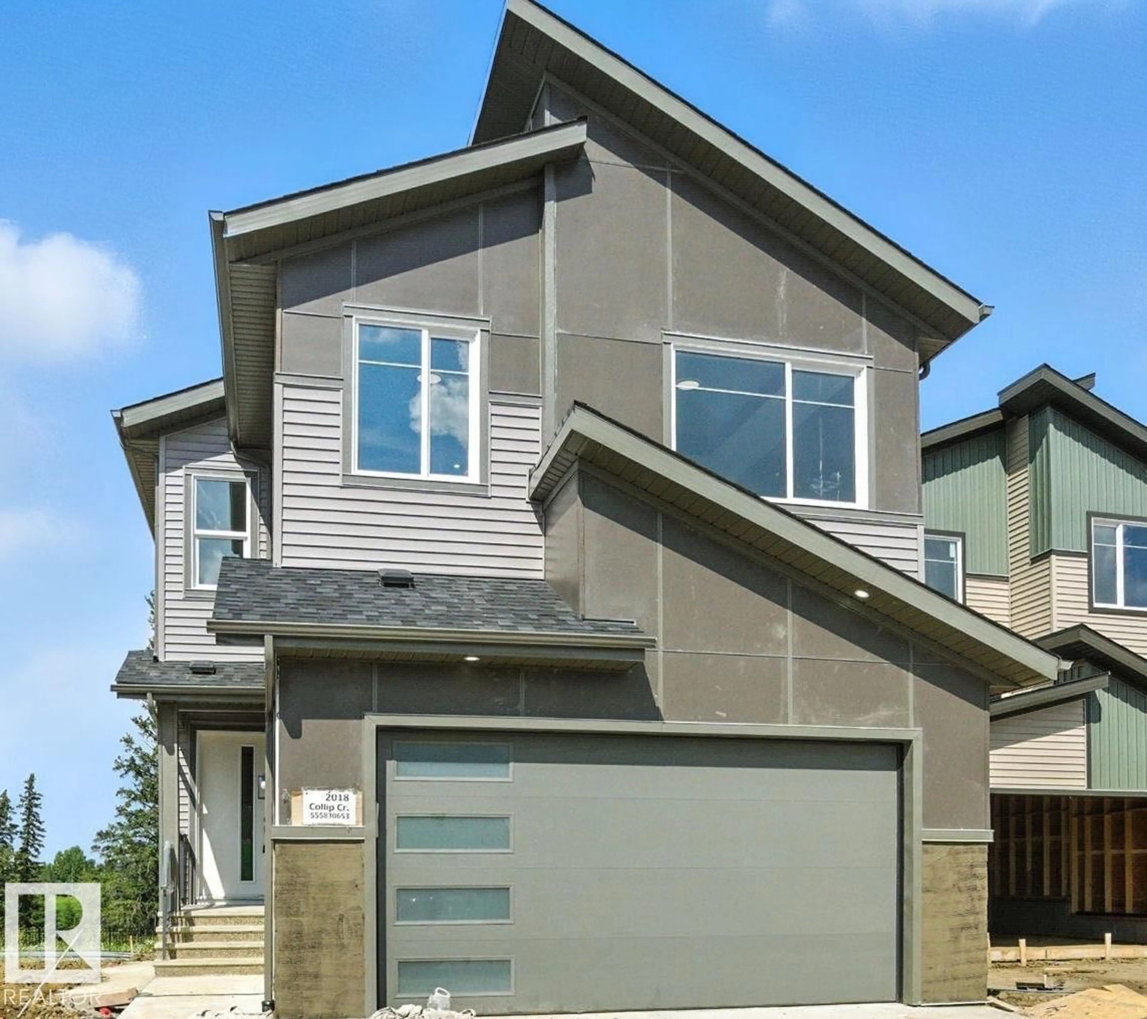Home with vinyl exterior material, street for SW - 2018 COLLIP CR, Edmonton Alberta T6W5T4