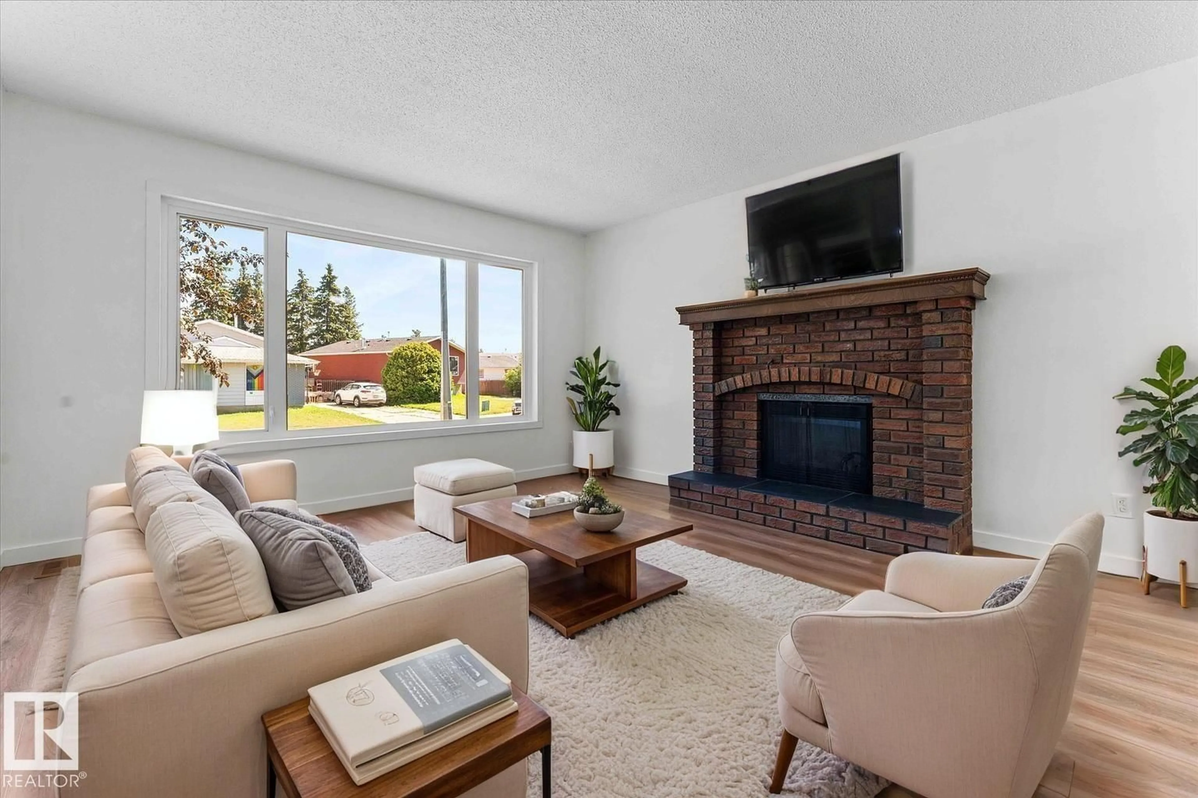 Living room with furniture, ceramic/tile floor for 13 GLORY HILLS DR, Stony Plain Alberta T7Z1H5