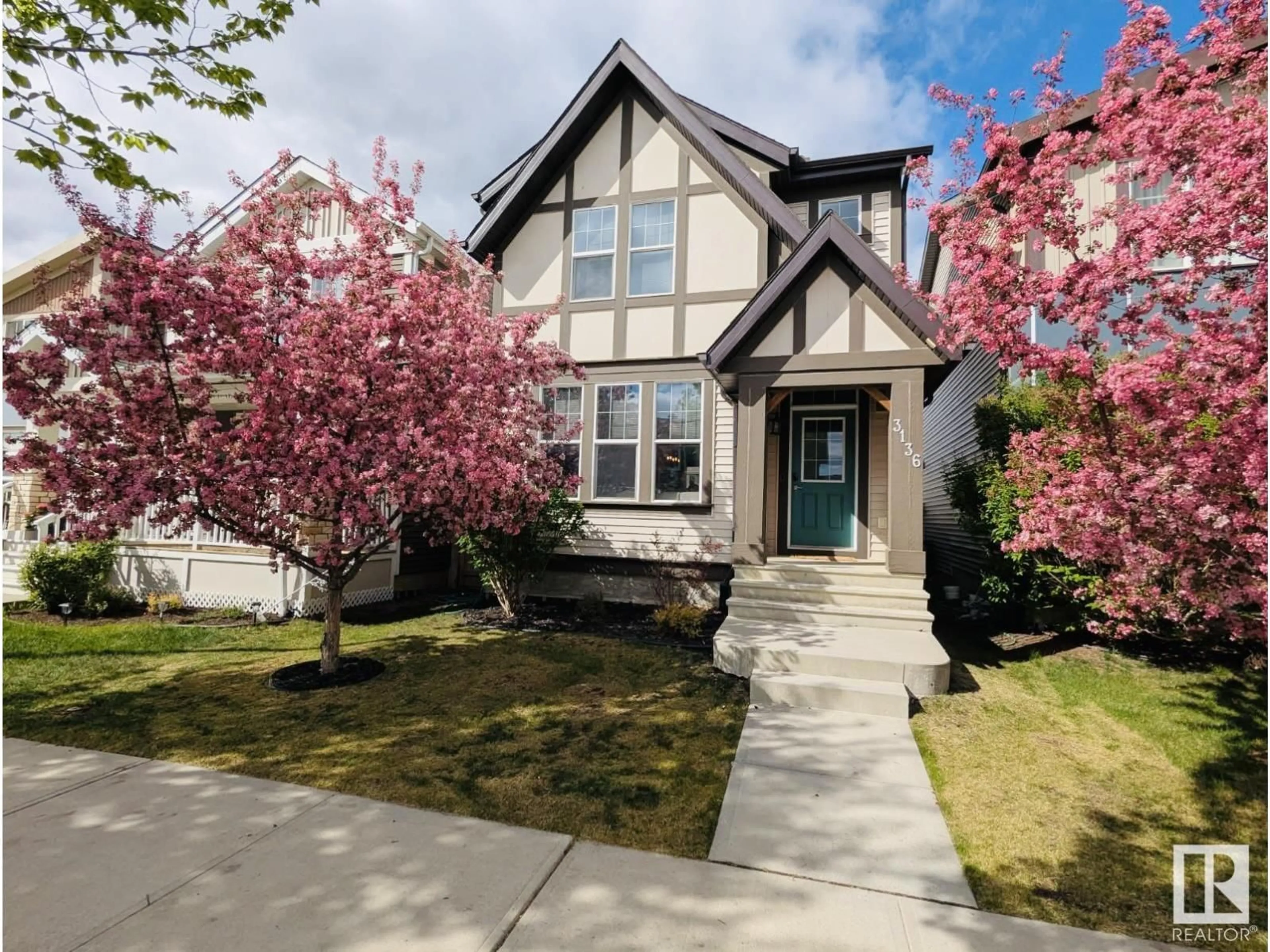 Home with vinyl exterior material, street for 3136 PAISLEY RD, Edmonton Alberta T6W2W8