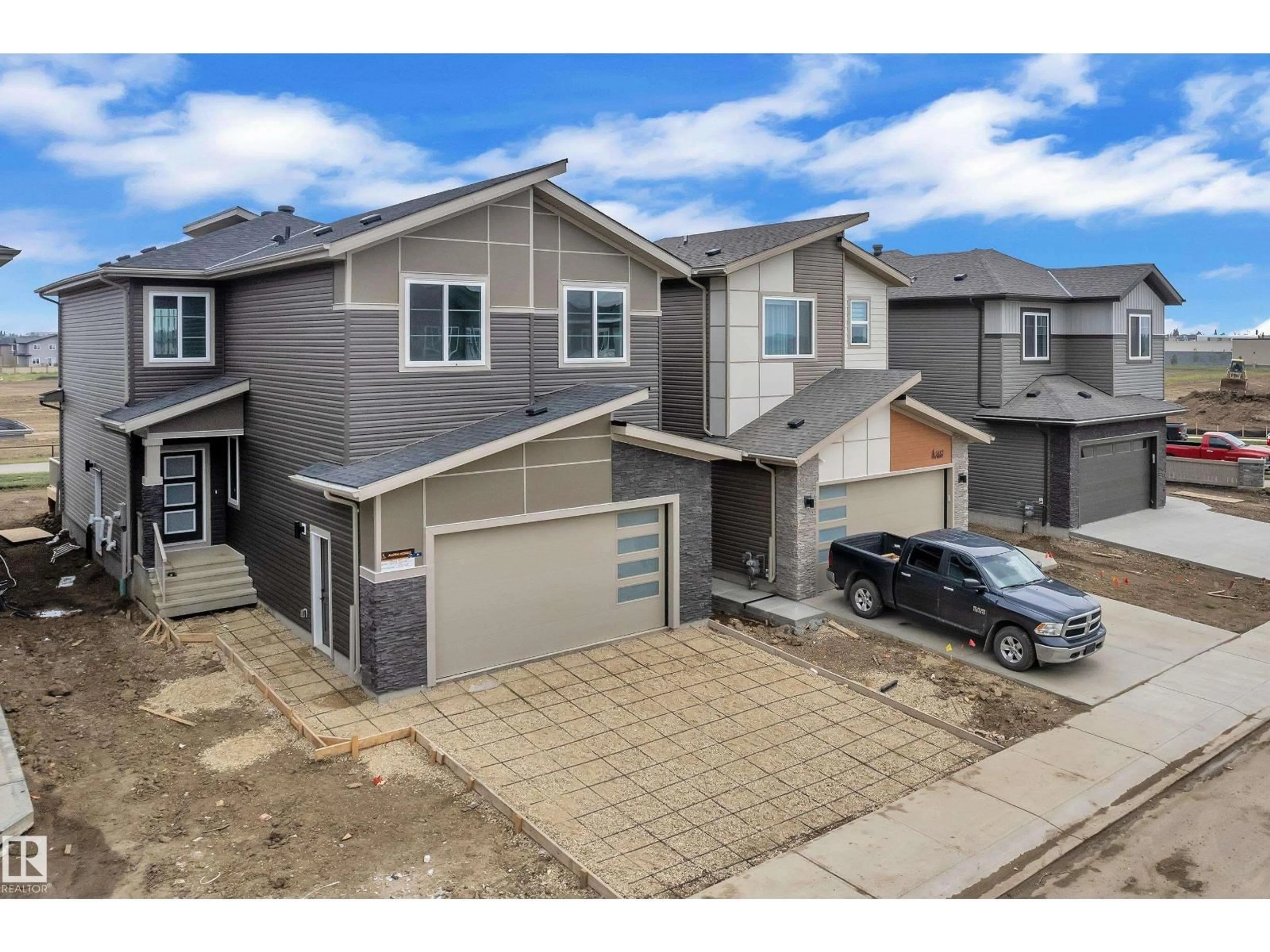 A pic from outside/outdoor area/front of a property/back of a property/a pic from drone, street for 404 PINE PT, Leduc Alberta T9E1S7