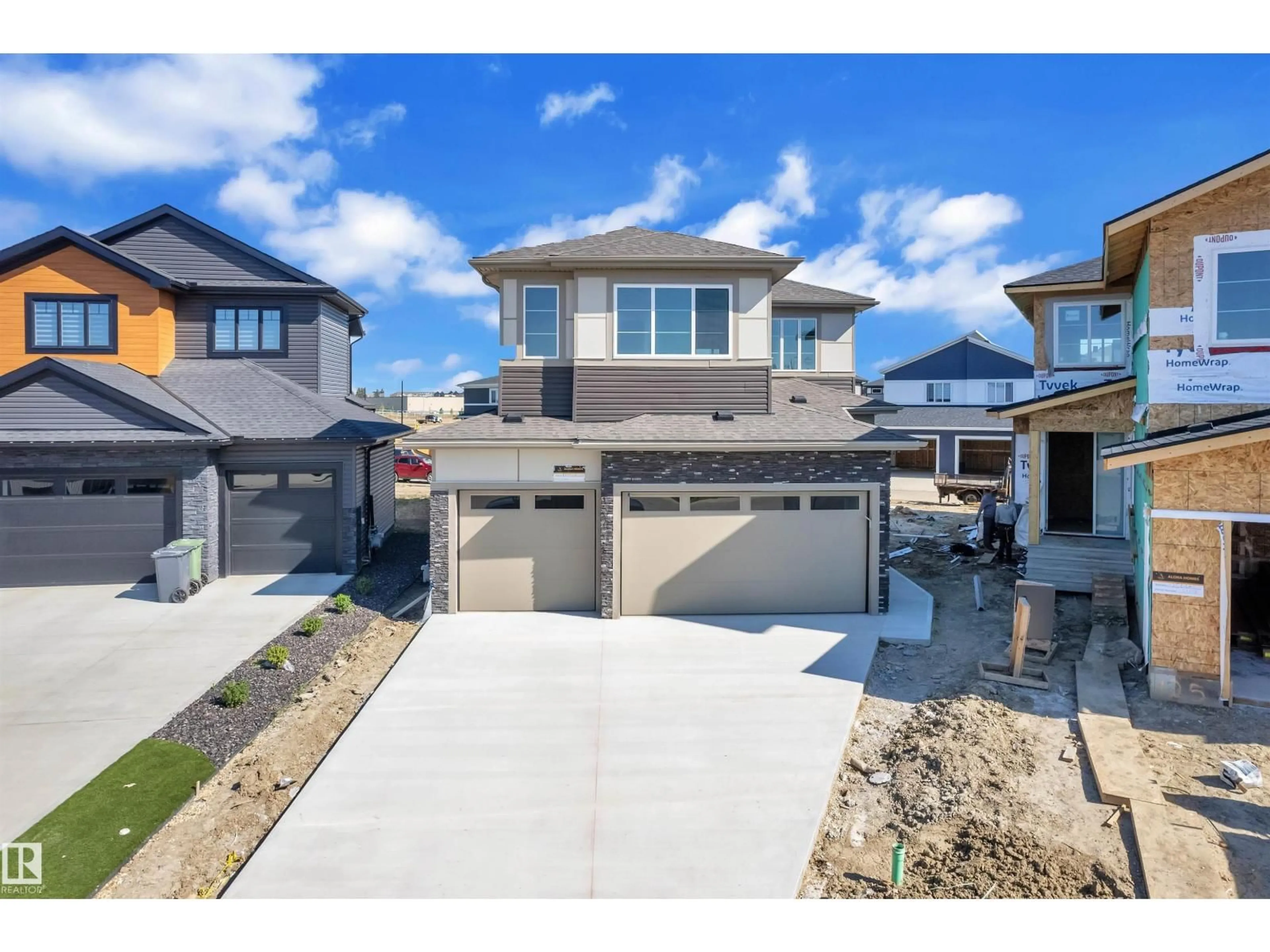 A pic from outside/outdoor area/front of a property/back of a property/a pic from drone, street for 127 LILAC CL, Leduc Alberta T9E1S7