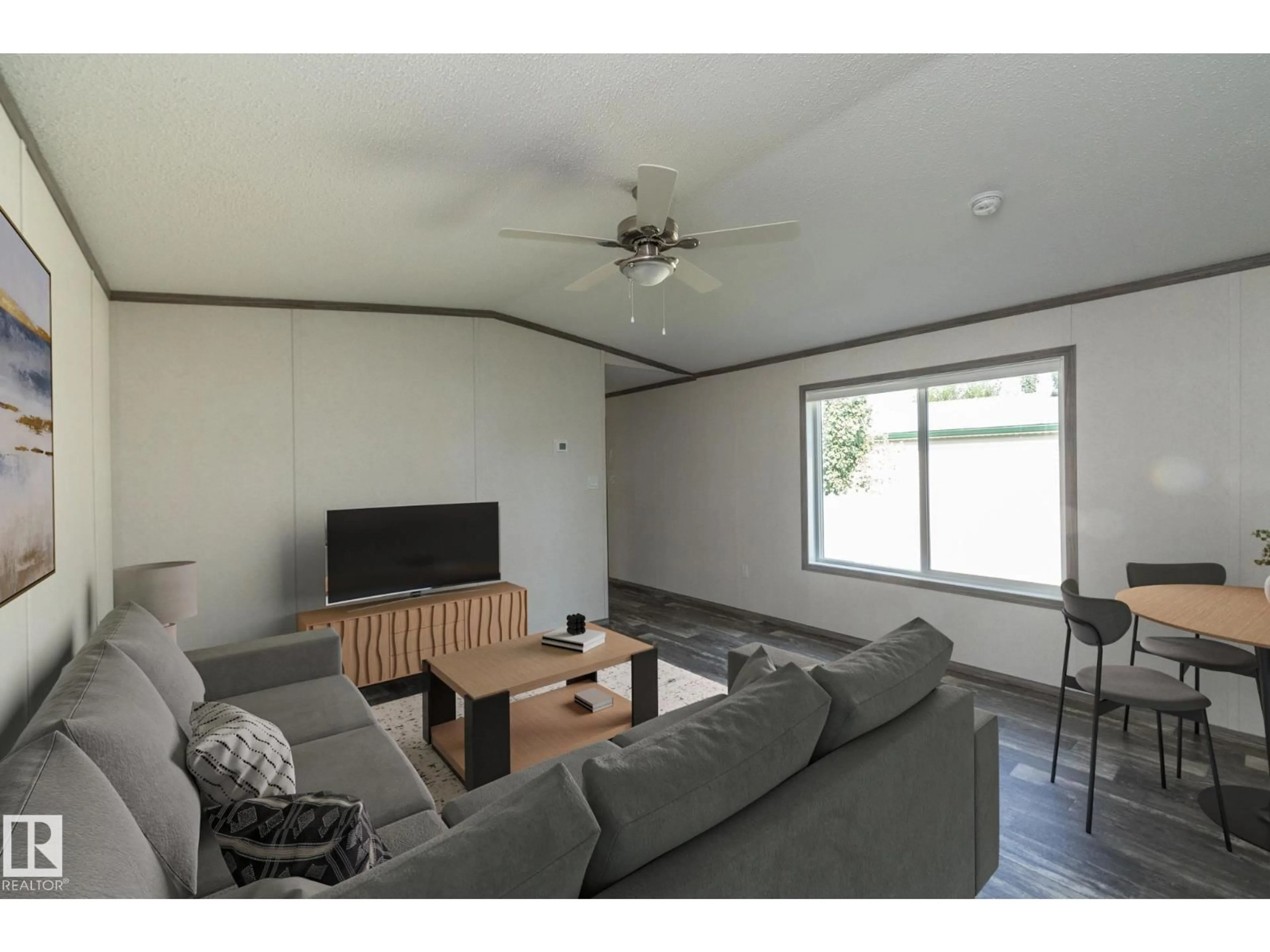 Living room with furniture, wood/laminate floor for 74 WILLOW PARK ES, Leduc Alberta T9E5R5