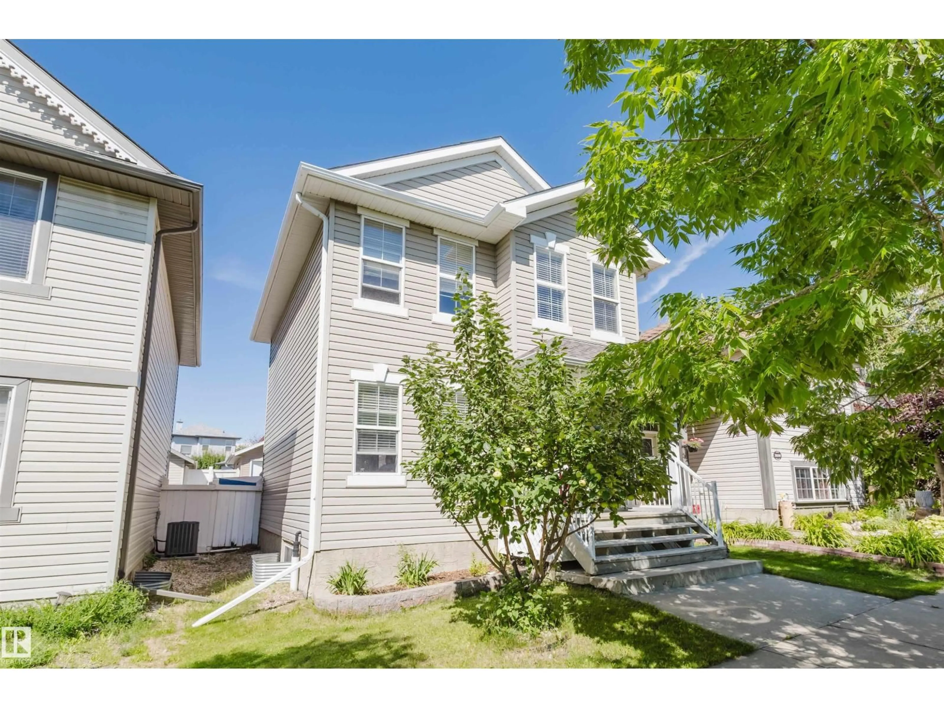 Home with vinyl exterior material, street for 3032 TRELLE CR, Edmonton Alberta T6R3M8