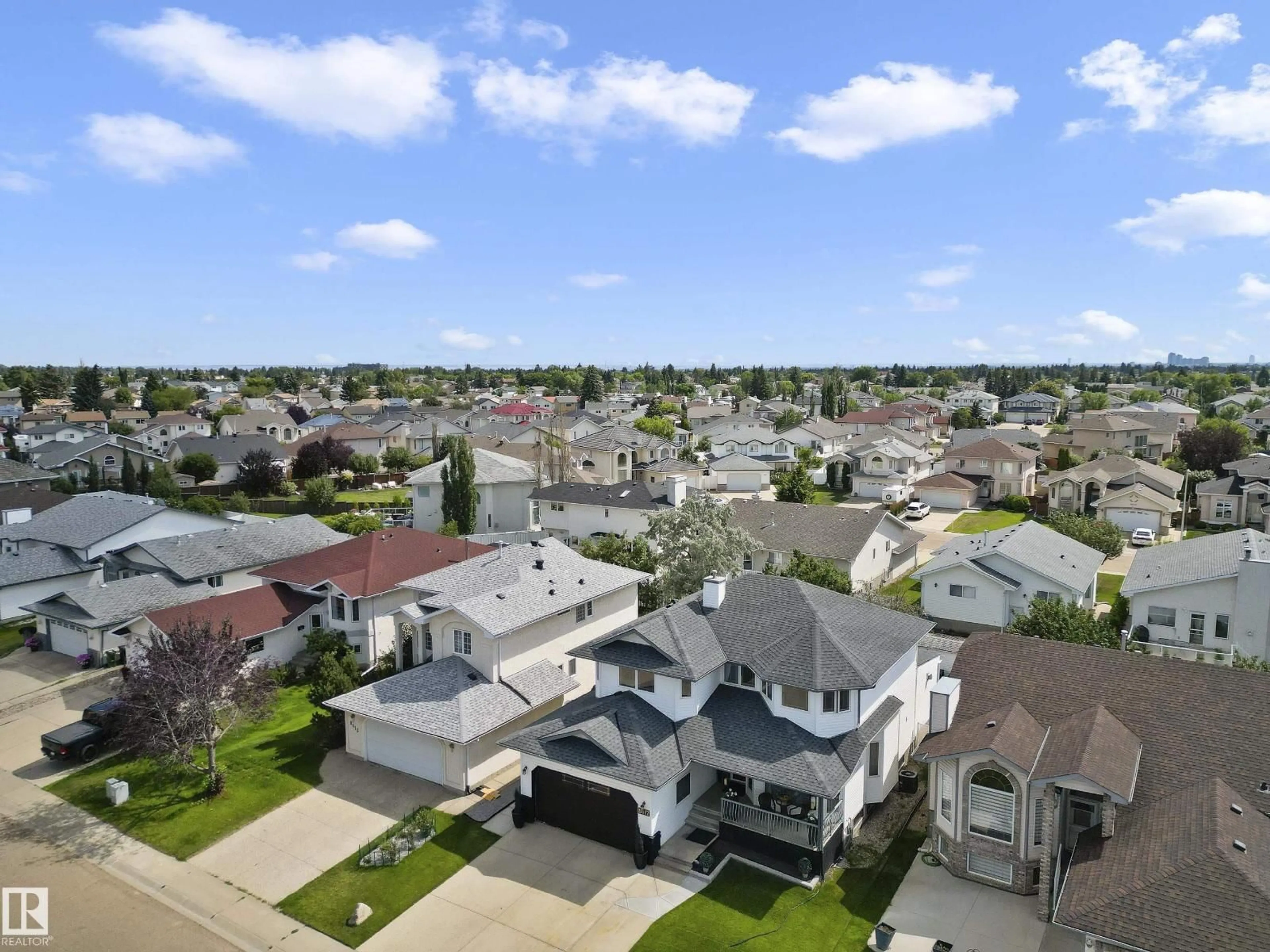 A pic from outside/outdoor area/front of a property/back of a property/a pic from drone, street for 8617 158A AV, Edmonton Alberta T5Z3B7
