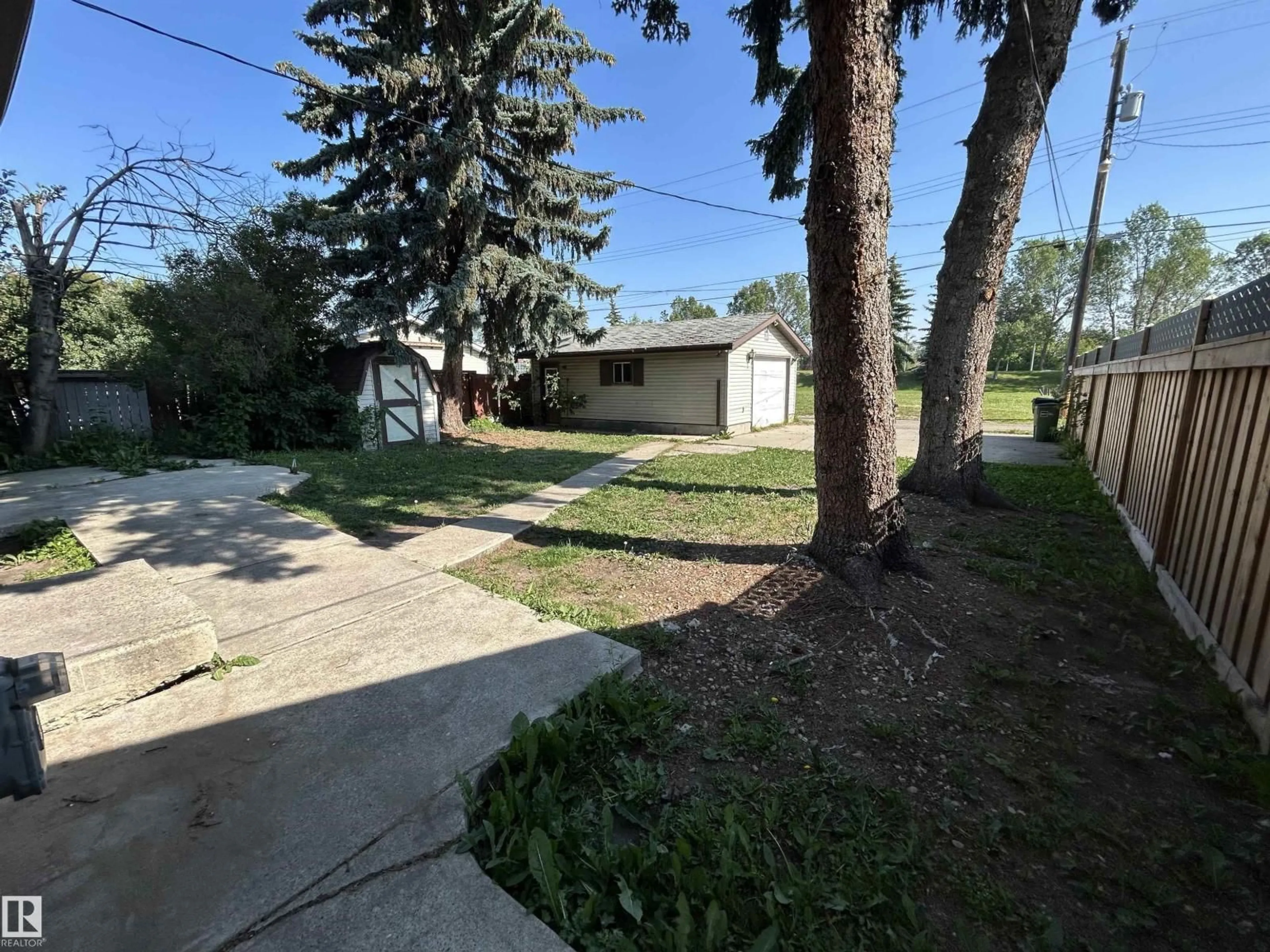 A pic from outside/outdoor area/front of a property/back of a property/a pic from drone, street for 16518 106 AV, Edmonton Alberta T5P0W9