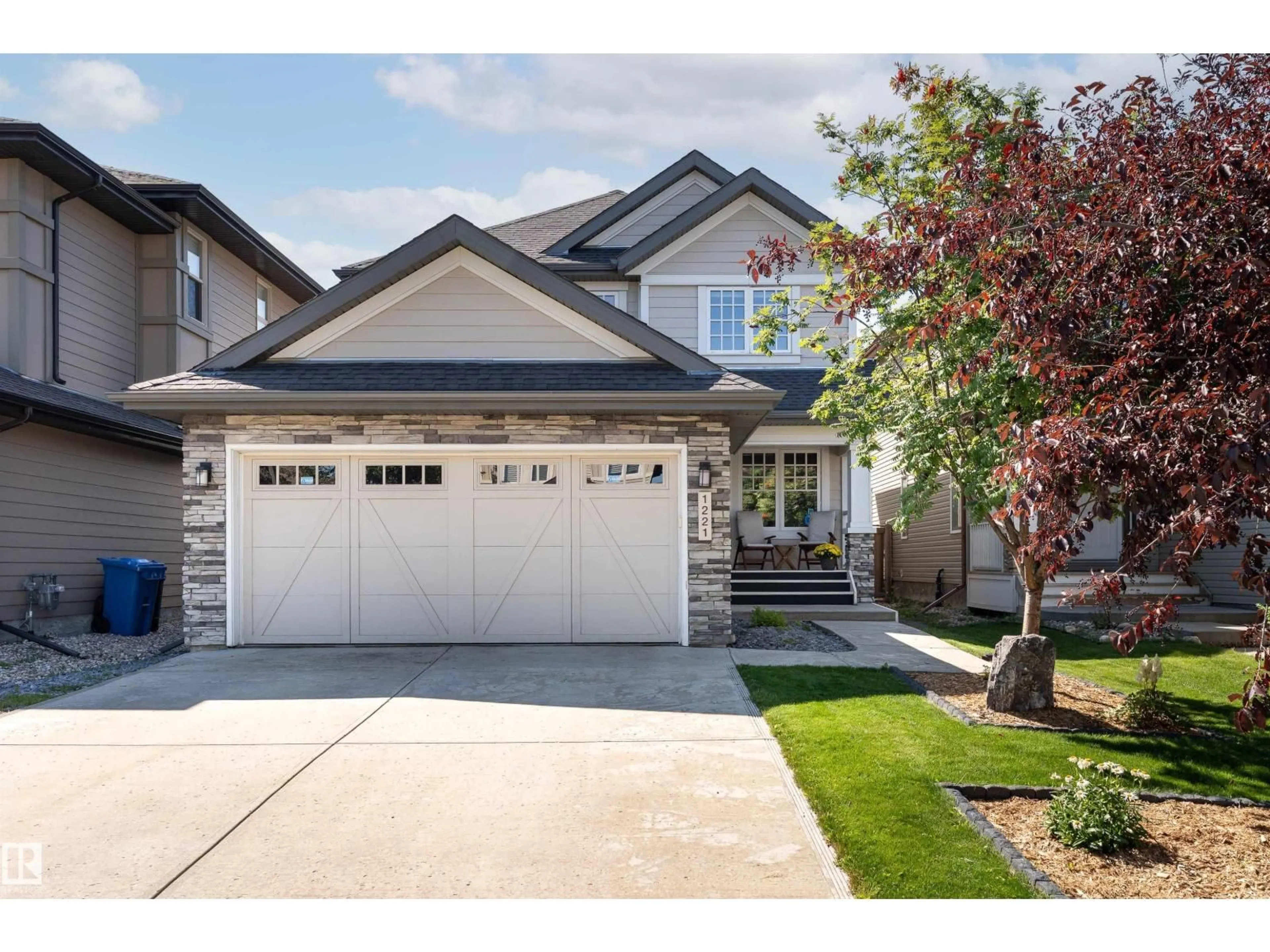Home with vinyl exterior material, street for 1221 AINSLIE WY, Edmonton Alberta T6W0H7