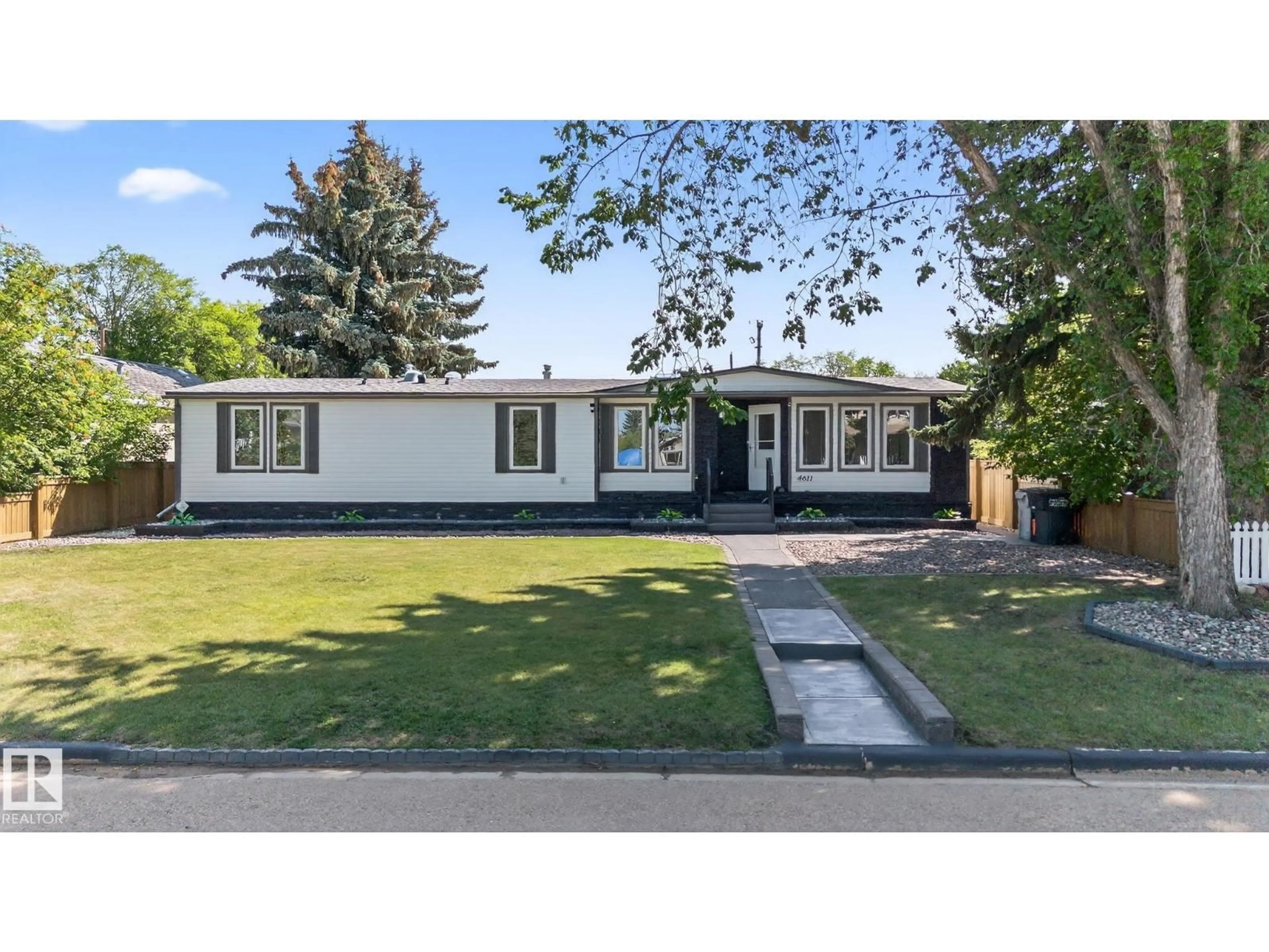 Home with vinyl exterior material, street for 4611 48 ST, Redwater Alberta T0A2W0