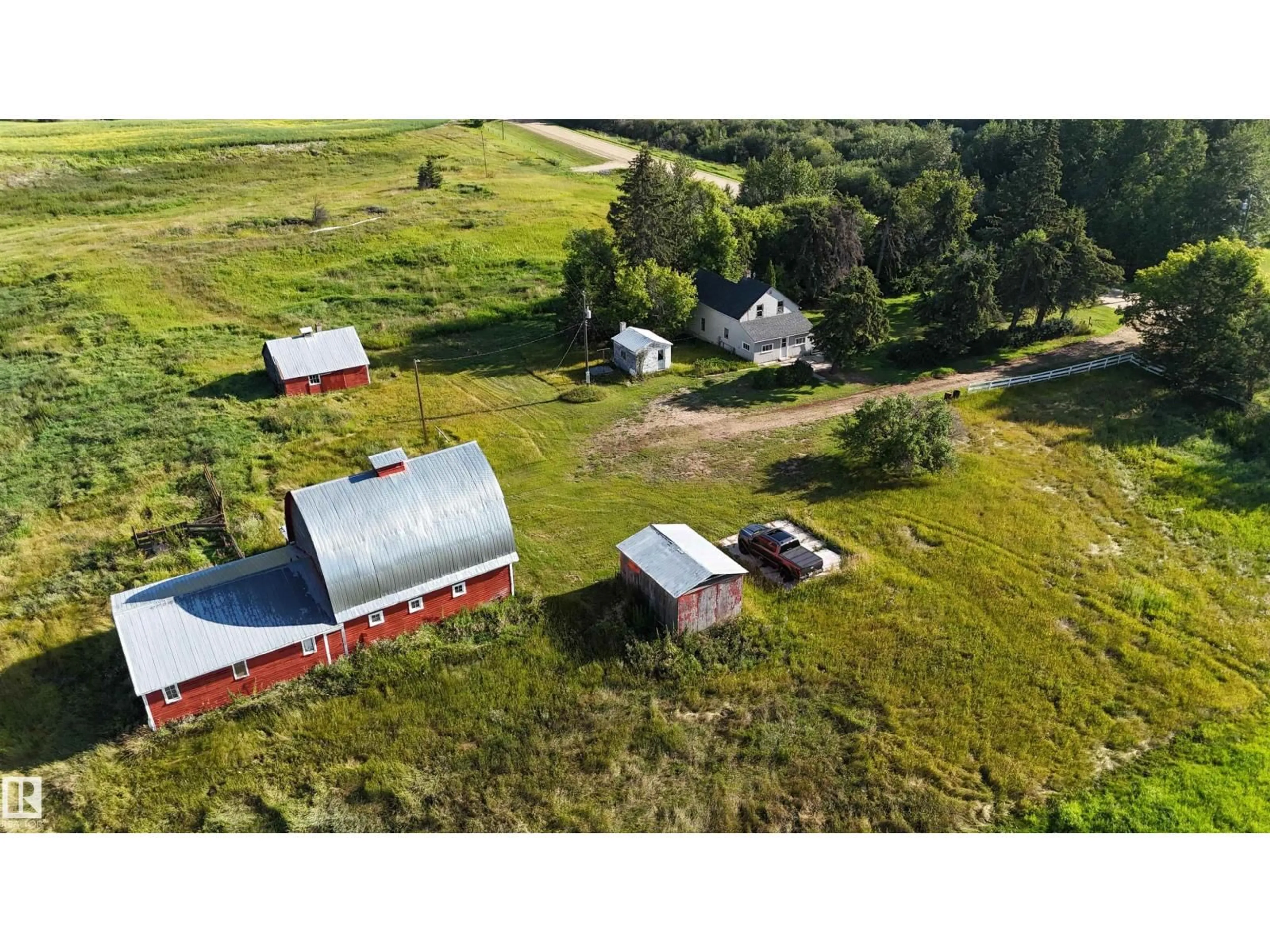 A pic from outside/outdoor area/front of a property/back of a property/a pic from drone, building for 52006 RGE RD 22, Rural Parkland County Alberta T7Y2J1