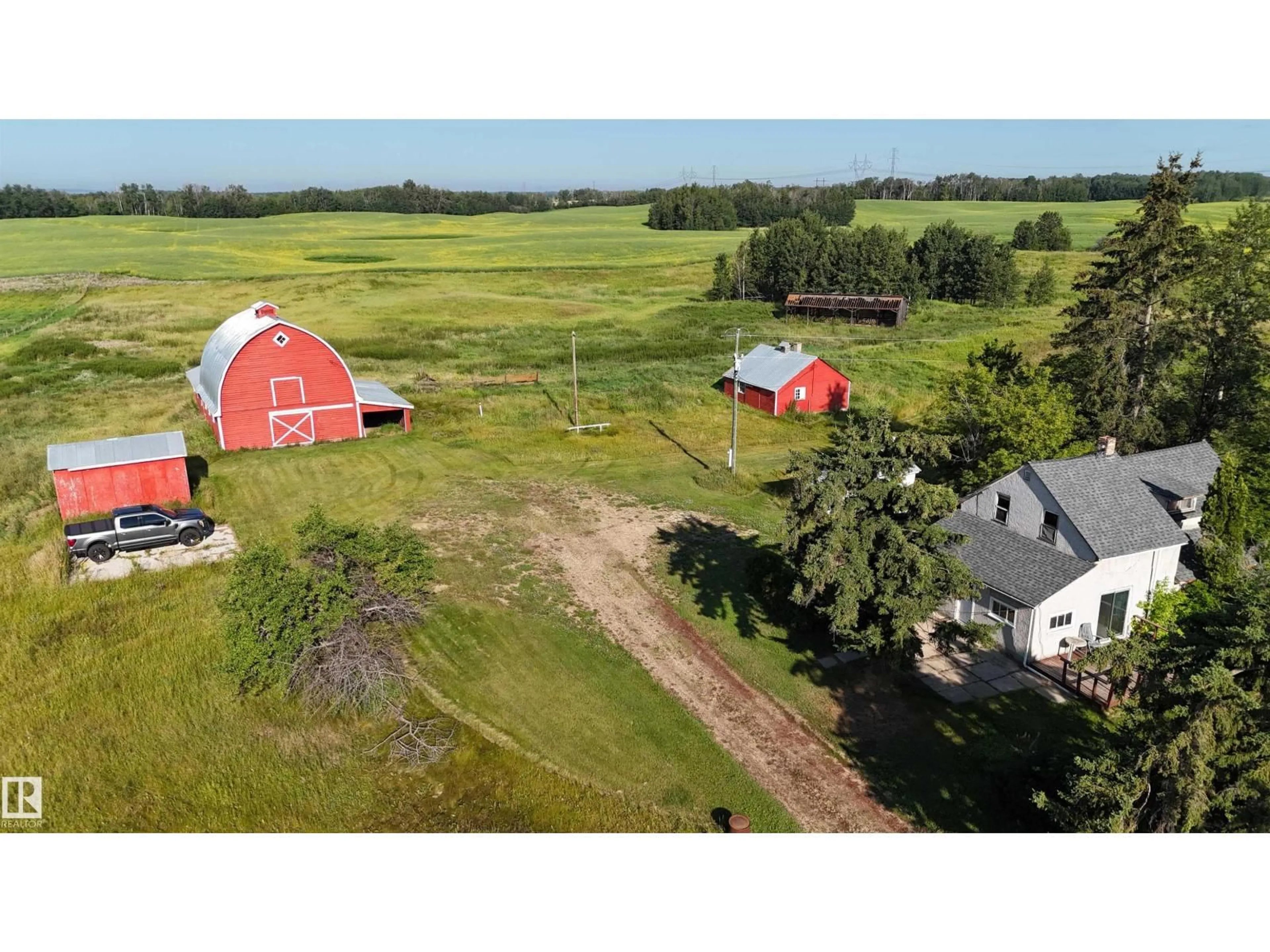 A pic from outside/outdoor area/front of a property/back of a property/a pic from drone, unknown for 52006 RGE RD 22, Rural Parkland County Alberta T7Y2J1