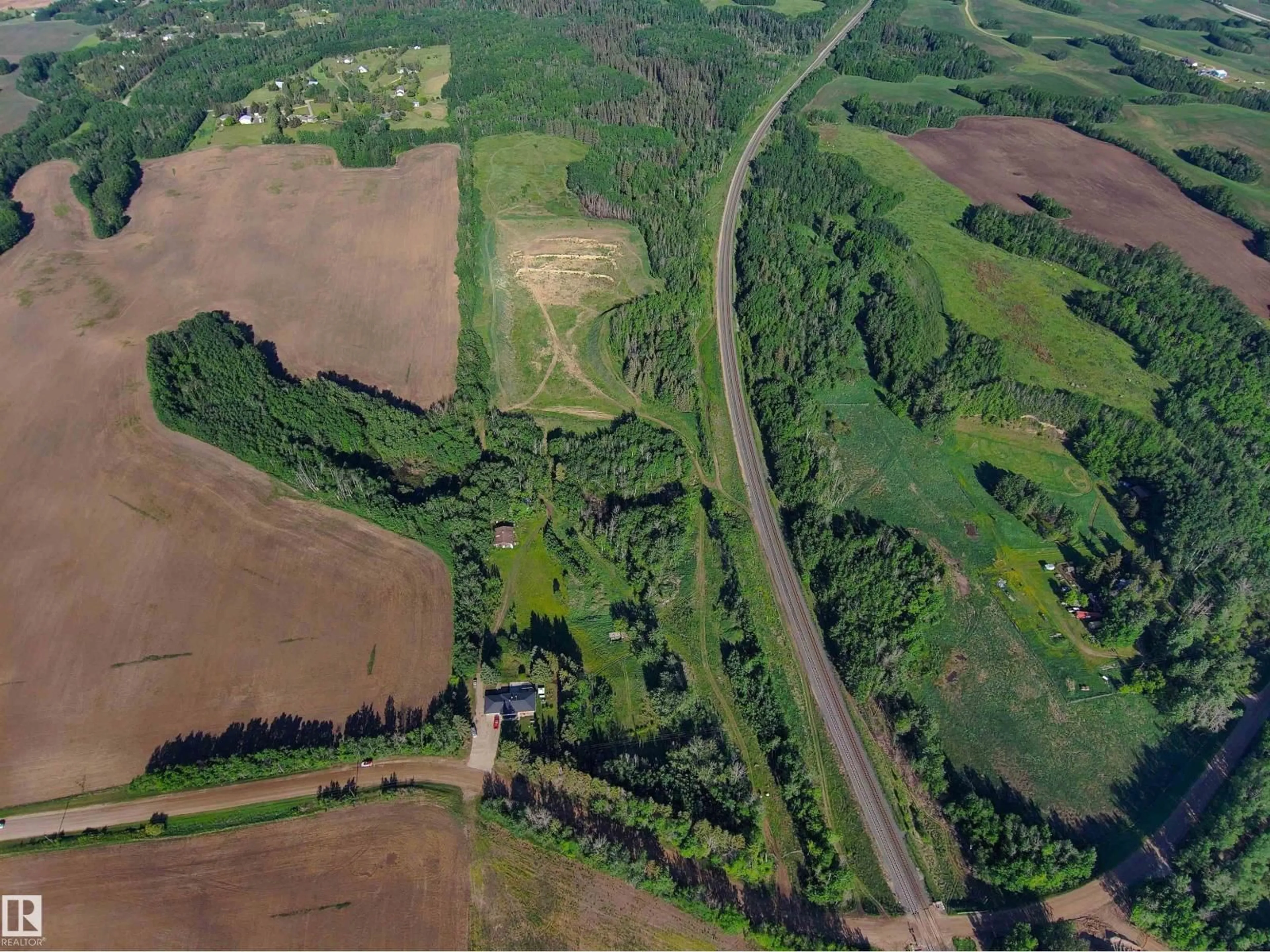 A pic from outside/outdoor area/front of a property/back of a property/a pic from drone, forest/trees view for 52502 RGE ROAD 12, Rural Parkland County Alberta T7Y2B9