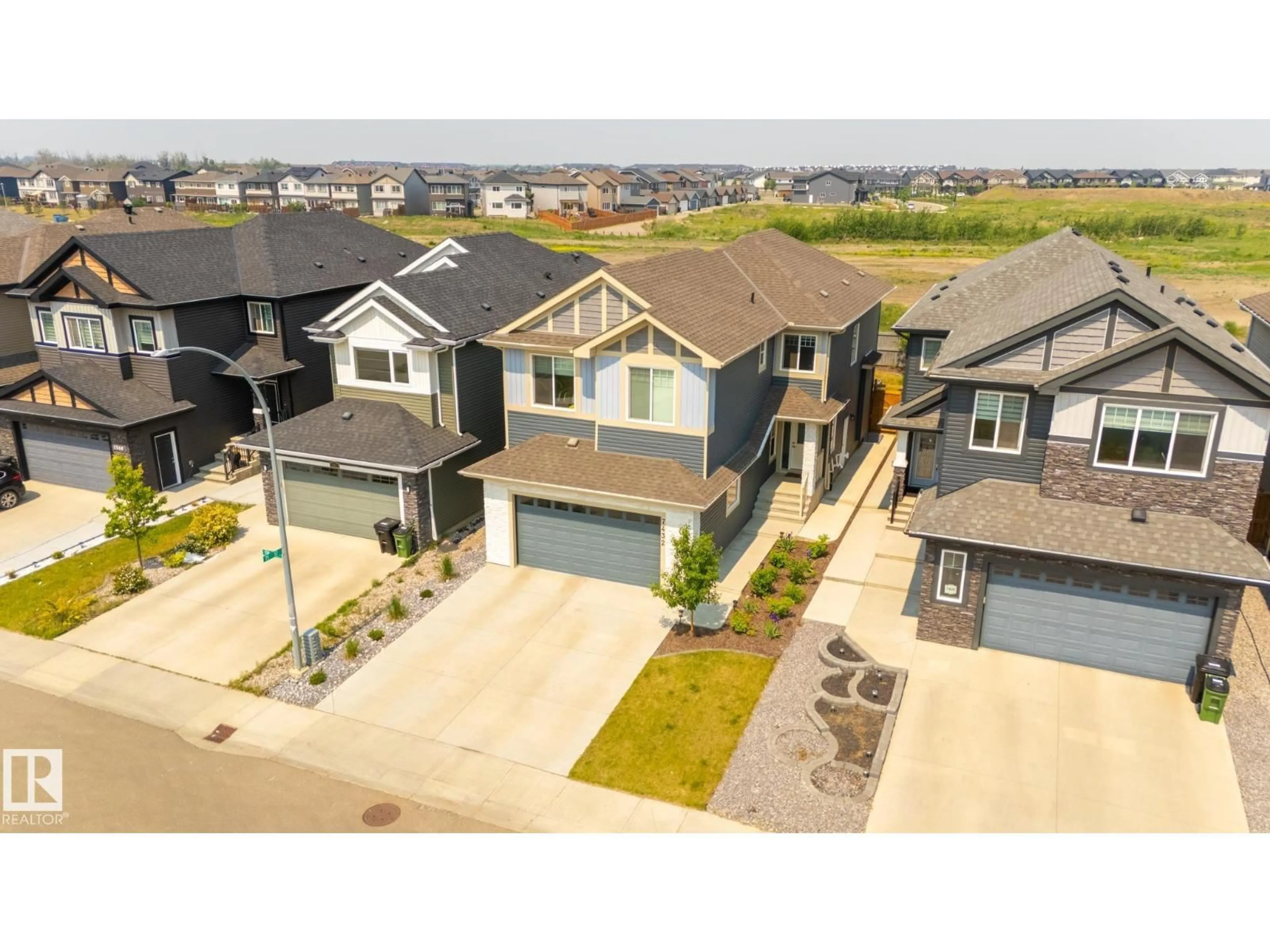 A pic from outside/outdoor area/front of a property/back of a property/a pic from drone, street for 7432 174 AV, Edmonton Alberta T5Z0J7