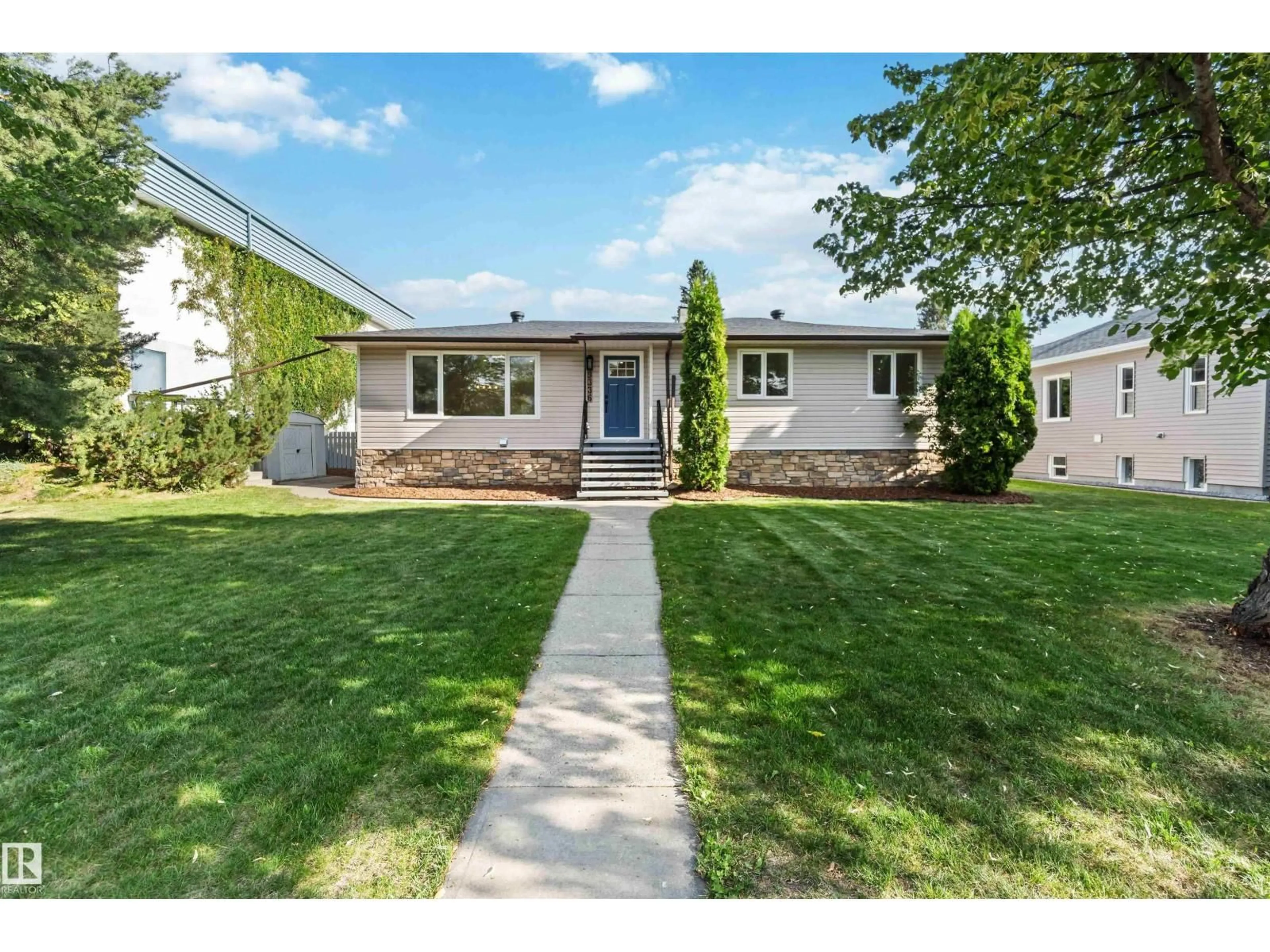 Home with vinyl exterior material, street for 9336 69 AV, Edmonton Alberta T6E0R9