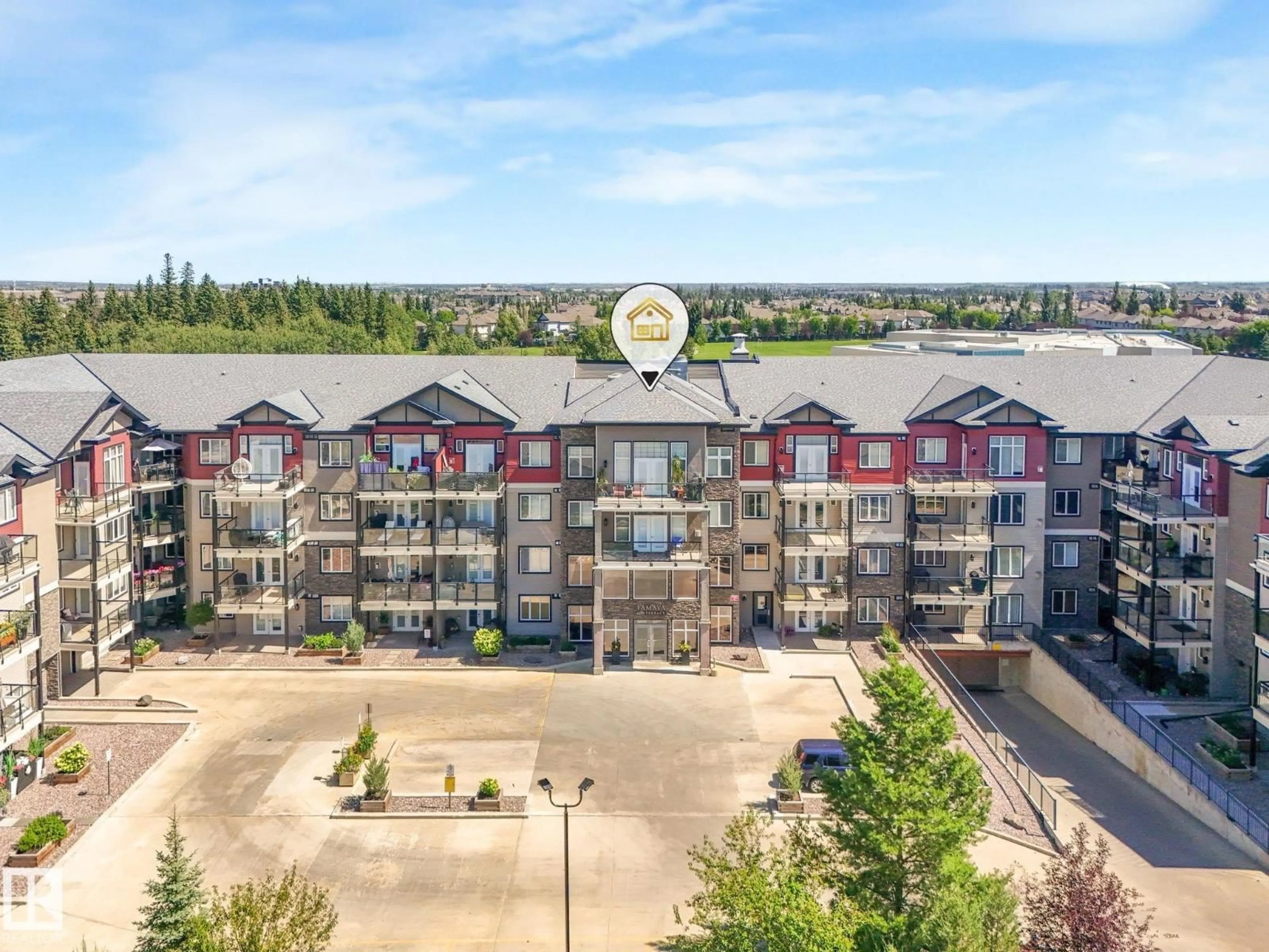 A pic from outside/outdoor area/front of a property/back of a property/a pic from drone, water/lake/river/ocean view for #412 - 12408 15 AV, Edmonton Alberta T6W1X2
